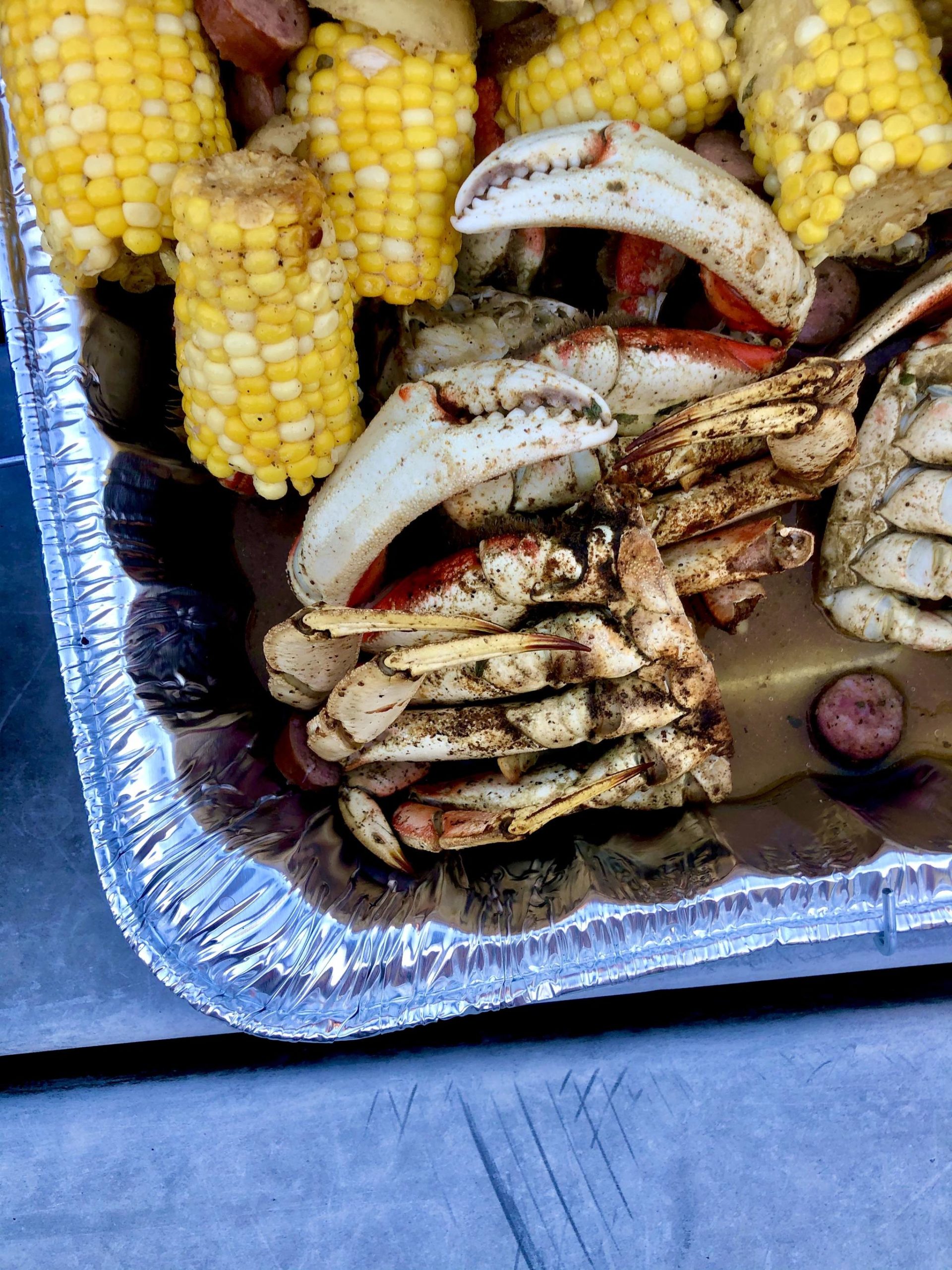 A crab boil to celebrate a friends birthday, on Sunday, Aug. 16, 2020 in Anchorage, Alaska. (Photo by Victoria Petersen/Peninsula Clarion)