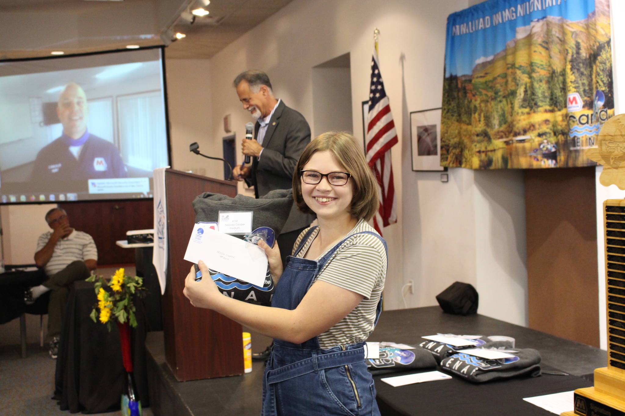 Nekoda Cooper smiles with her award for being a Caring for the Kenai Finalist during the Caring for the Kenai Awards Ceremony at the Kenai Visitor Center on Aug. 19, 2020. (Photo by Brian Mazurek/Peninsula Clarion)
