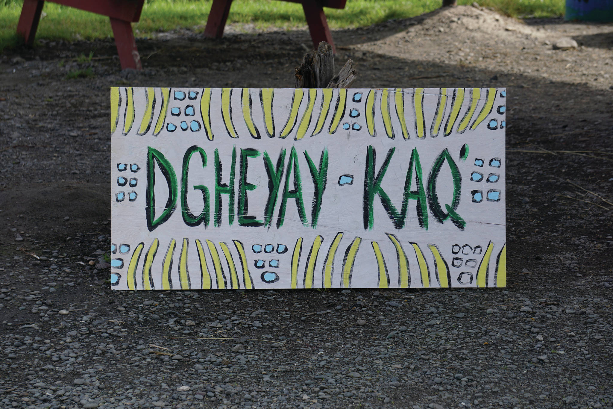 A sign at “Land Acknowledgement in Action: Sign Installation” shows the Dena’Ina words for Anchorage at the event last Saturday, Aug. 22, 2020, at the Bishop’s Beach pavillion — the area known by the Dena’ina people as “Tuggeht,” or “at the water’s edge.” (Photo by Michael Armstrong/Homer News.