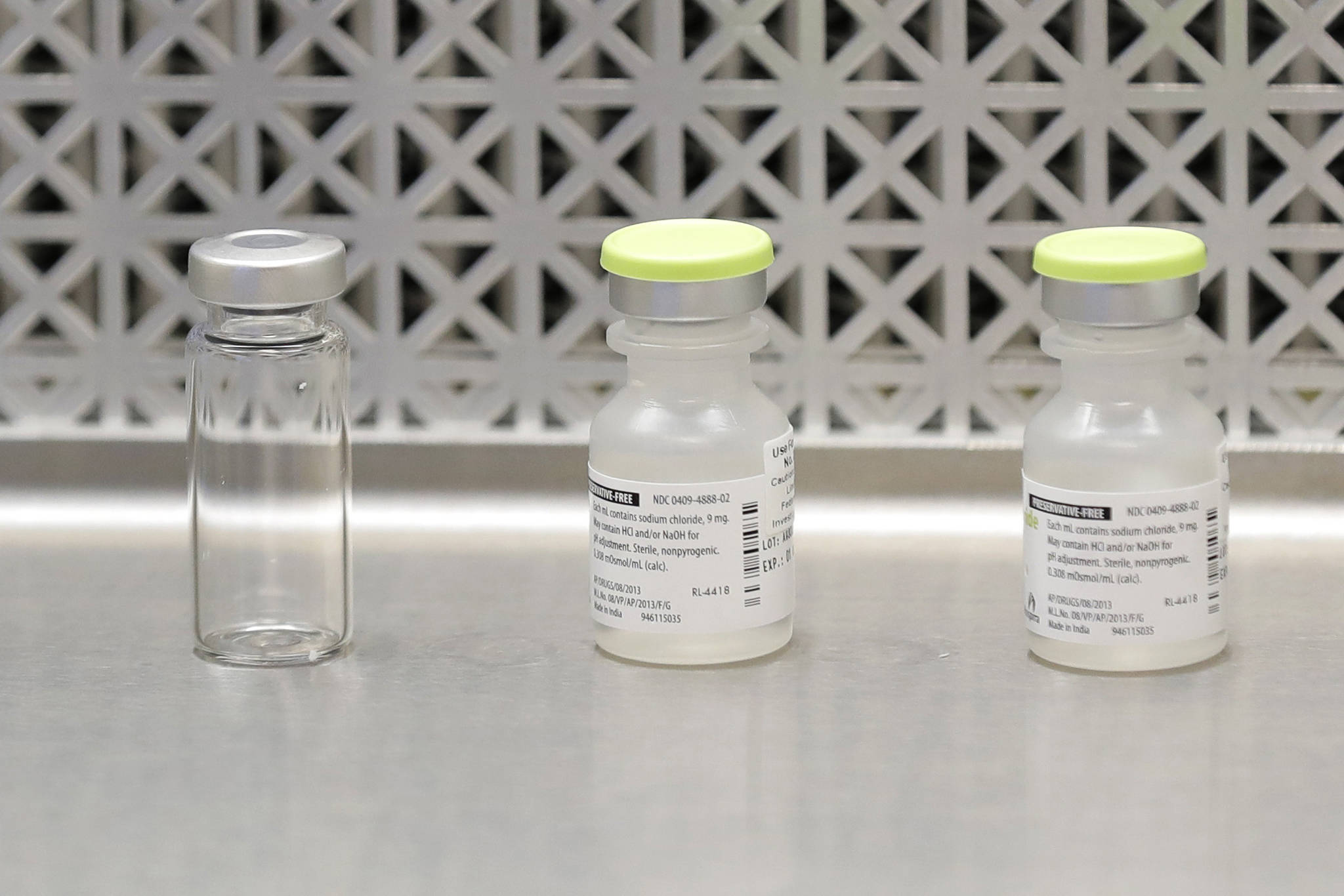 Ted S. Warren / Associated Press                                This photo shows vials used by pharmacists to prepare syringes used on the first day of a first-stage safety study clinical trial of the potential vaccine for COVID-19, the disease caused by the new coronavirus, in Seattle. State health officials say that once a vaccine is ready, Alaska has existing networks to distribute it.