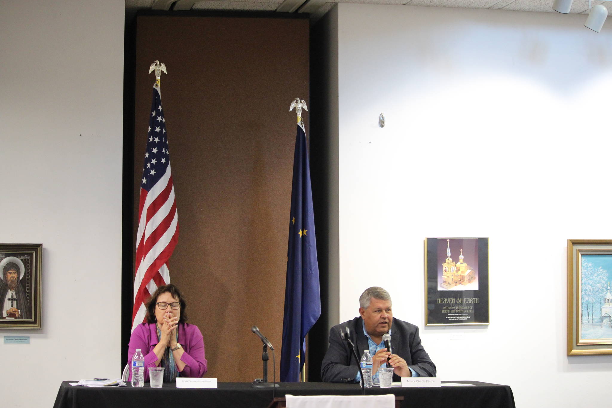 Linda Farnsworth Hutchings, left, and Kenai Peninsula Borough Mayor Charlie Pierce, right, participate in a mayoral candidate forum hosted by the Kenai Chamber of Commerce at the Kenai Visitor and Cultural Center on Wednesday, Sept. 9, 2020. (Photo by Brian Mazurek/Peninsula Clarion)
