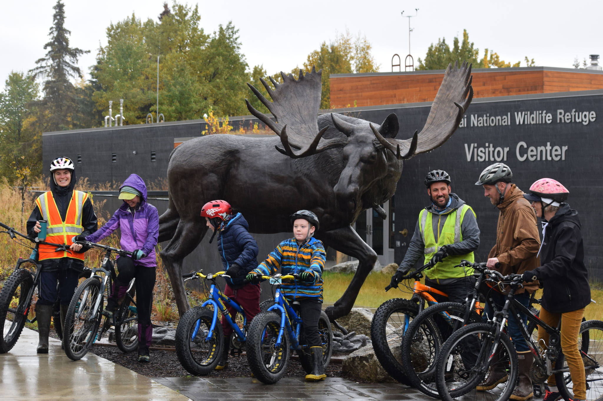Kaitlin Vadla (far left) prepares to lead a group of bike riders on a trail ride at the Kenai National Wildlife Refuge Visitor Center on Saturday, Sept. 26 just outside Soldotna, Alaska.                                Kaitlin Vadla (far left) prepares to lead a group of bike riders on a trail ride at the Kenai National Wildlife Refuge Visitor Center on Saturday, Sept. 26 just outside Soldotna, Alaska.
