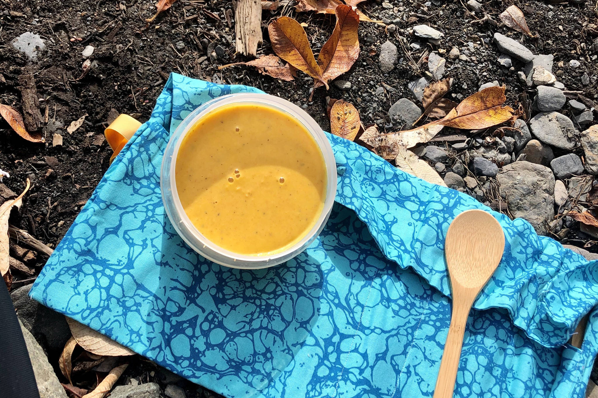 Butternut squash soup picnic is enjoyed on the rocky beach at Eklutna Lake, on Sunday, Sept. 27, 2020 in Anchorage, Alaska. (Photo by Victoria Petersen/Peninsula Clarion)