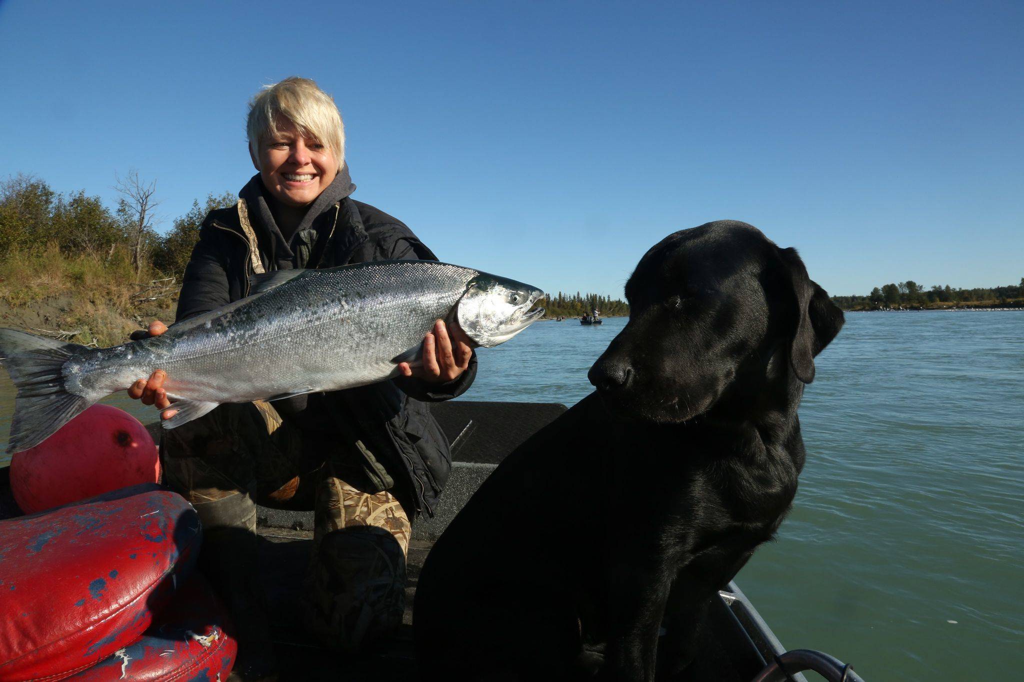 Christine Cunningham, Assistant to the Kenai City Manager, shows off a silver salmon she caught for the 4th annual Kenai Silver Salmon Derby in this undated photo. (Courtesy Christine Cunningham)