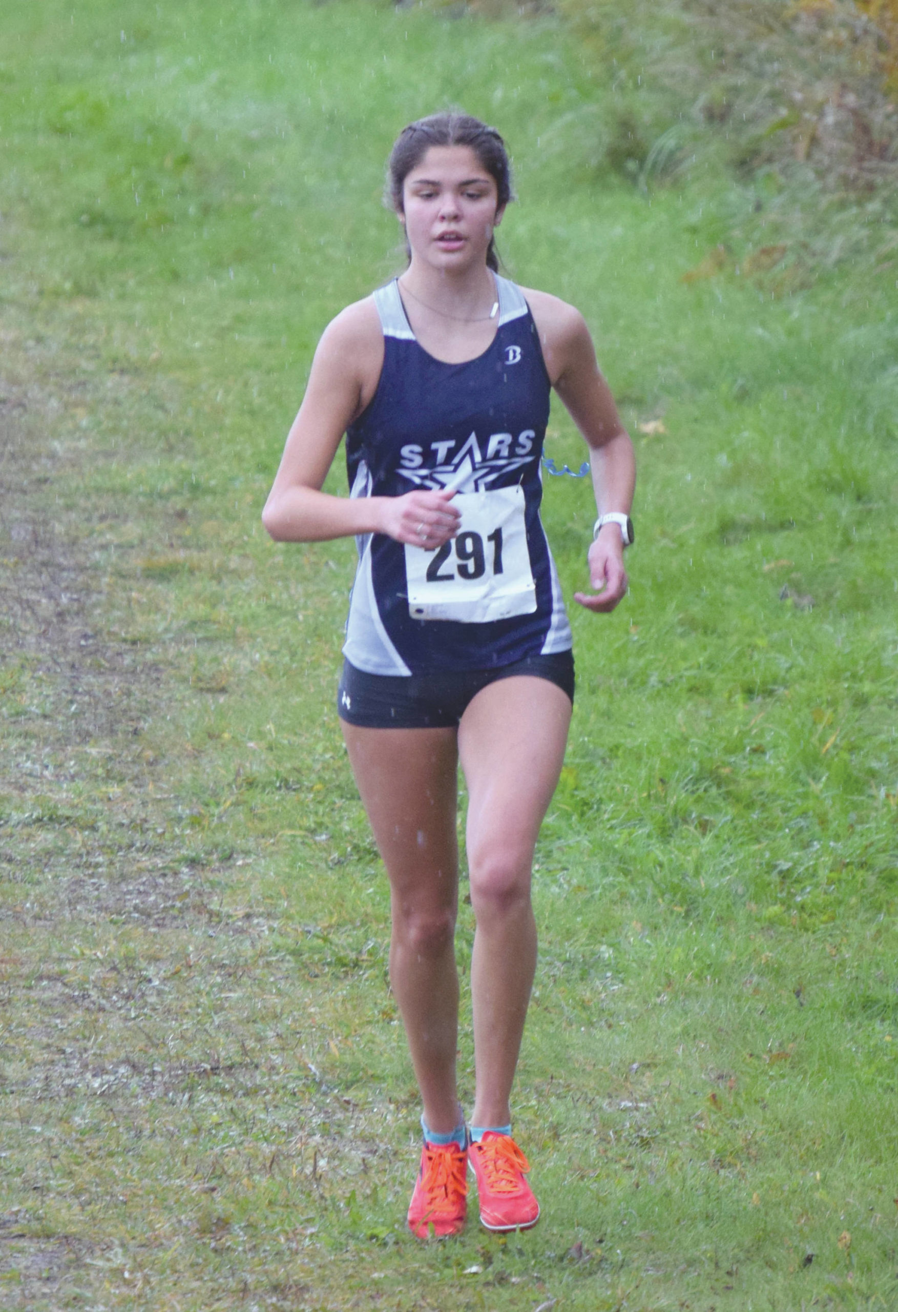 Soldotnas Erika Arthur runs to second place in the Kenai Peninsula Borough cross-country race Saturday, Sept. 26, 2020, at Tsalteshi Trails just outside of Soldotna, Alaska. (Photo by Jeff Helminiak/Peninsula Clarion)