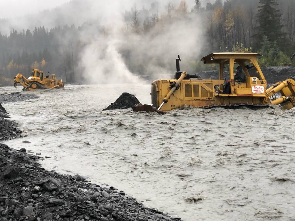 Photo courtesy KPB Incident Management Team                                 Heavy equipment operators attempt to mitigate flooding in Kwechak Creek in Seward on Saturday.