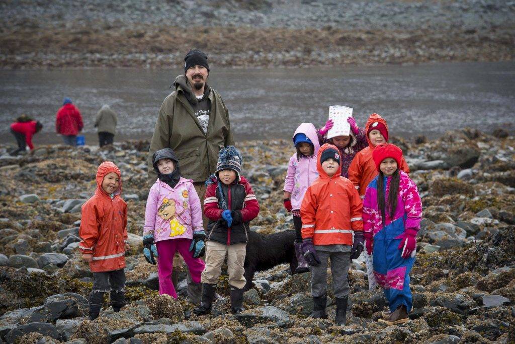 Jim Reinseth, a teacher at Nanwalek School who died on Tuesday in a house fire, is seen here with his students on April 18, 2018. (Courtesy KPBSD)