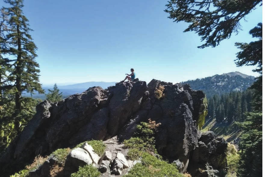 The author is seen here, sharing the world at Lassen Volcanic National Park in California. (Photo courtesy of Patrick Lewis)