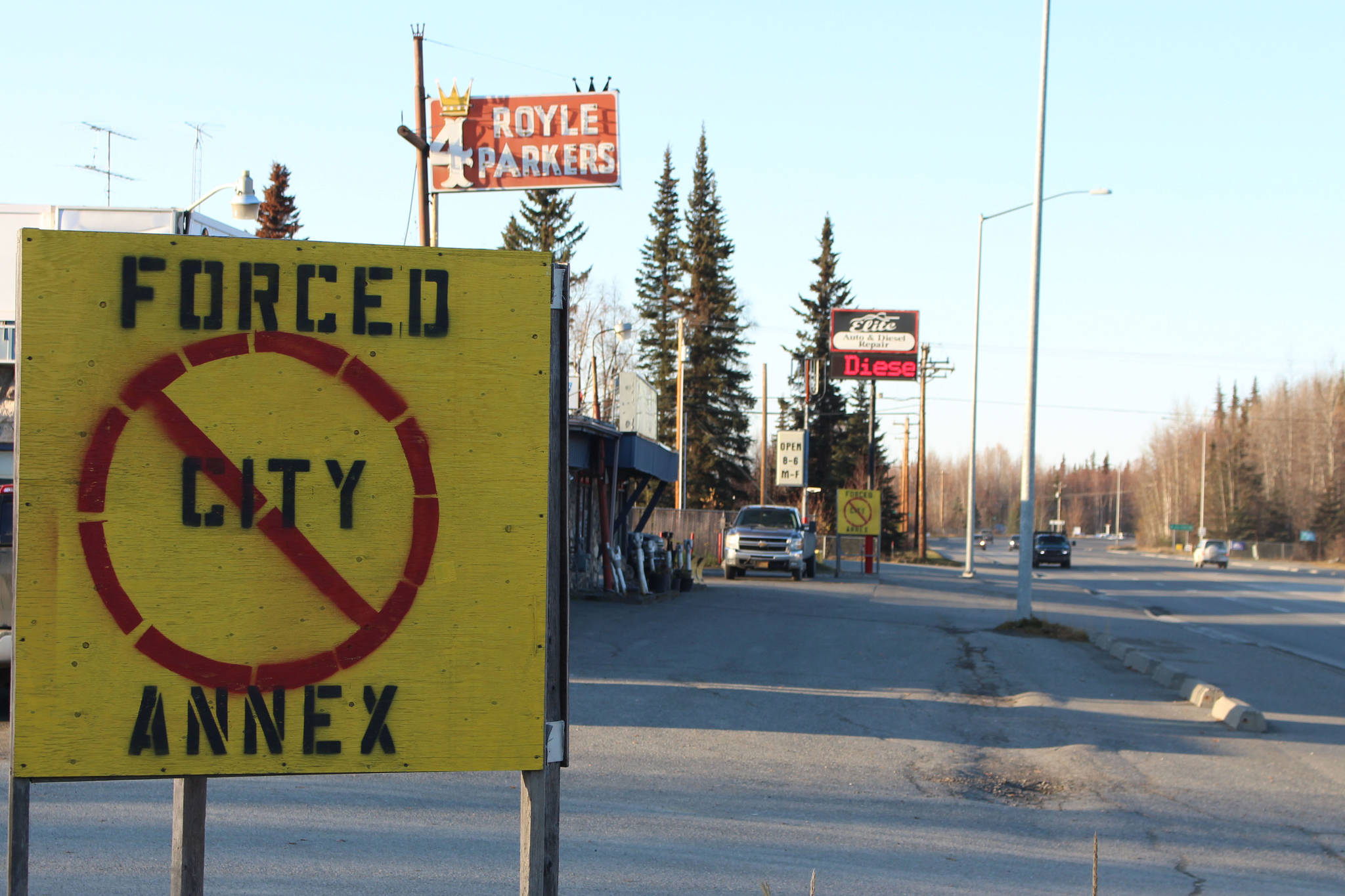 Signs protesting the annexation petition proposed by the City of Soldotna are seen along the Kenai Spur Highway, in Soldotna, on Tuesday, Oct. 21. (Photo by Brian Mazurek/Peninsula Clarion)