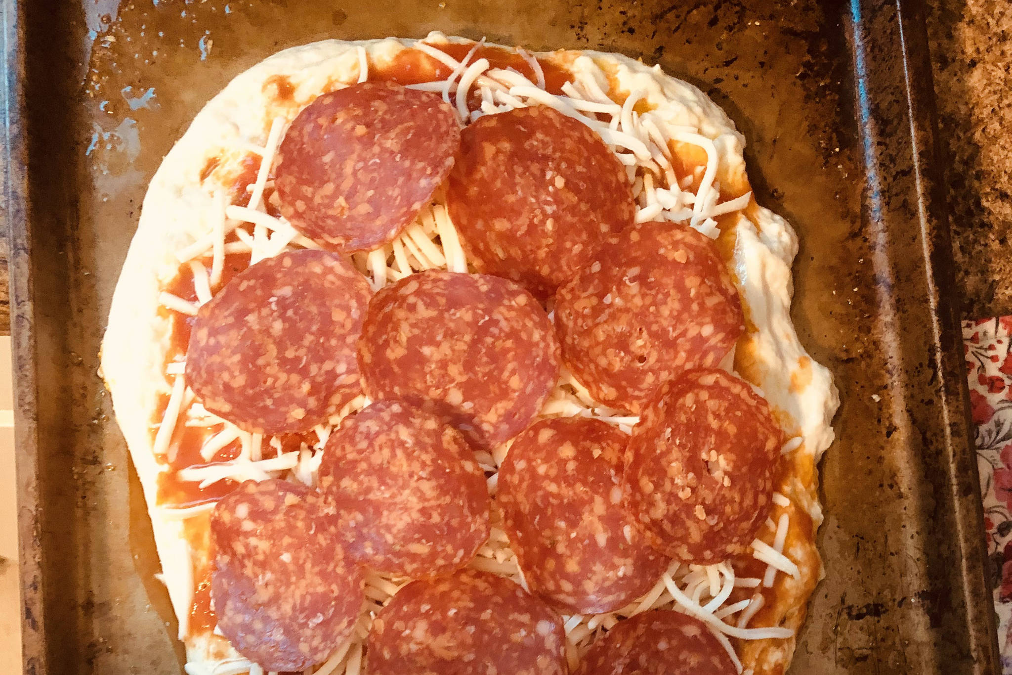 Pepperoni pizza is ready to go into the oven, on Monday, Nov. 2, 2020, in Anchorage, Alaska. (Photo by Victoria Petersen/Peninsula Clarion)