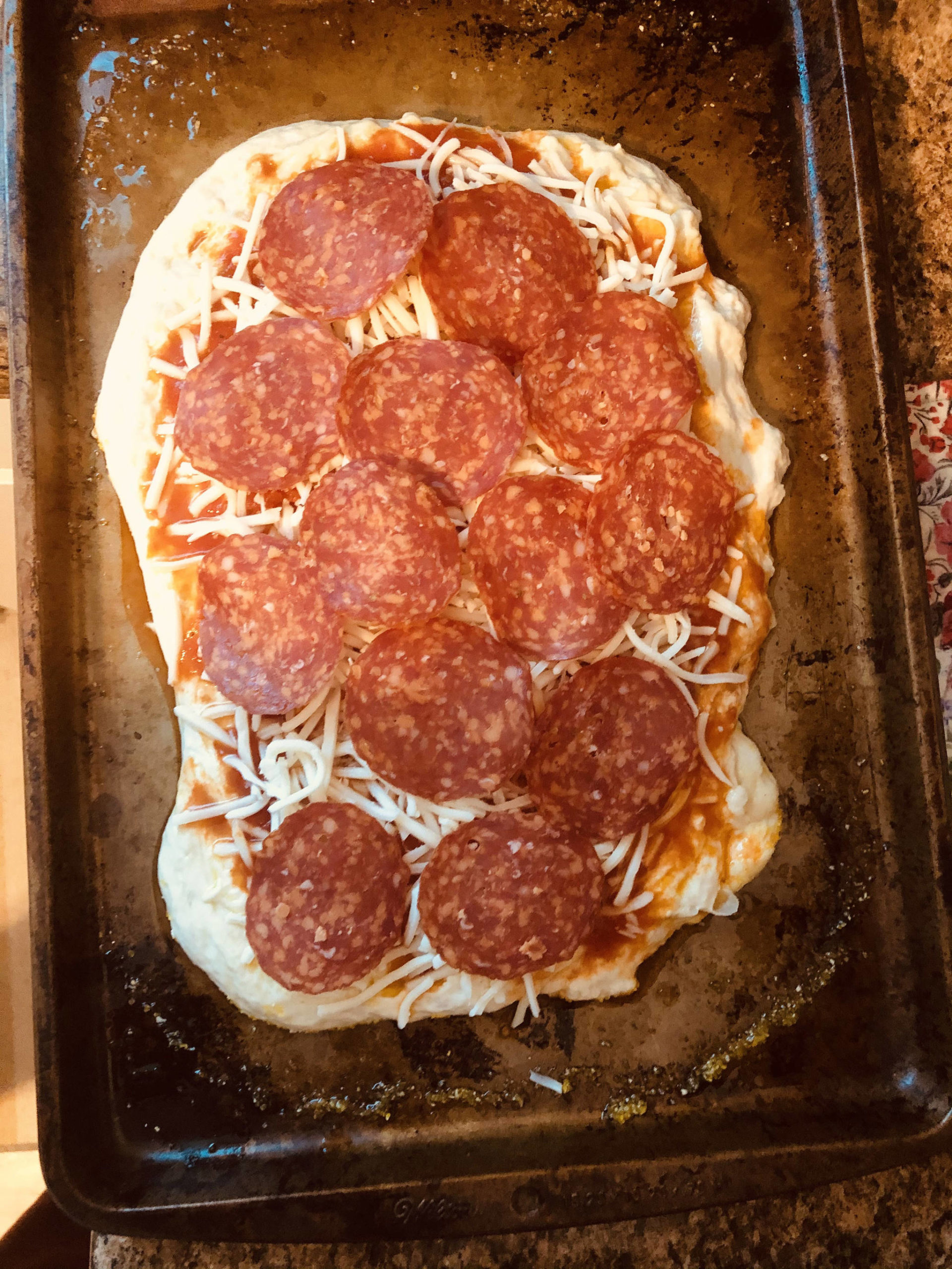 Pepperoni pizza ready to go into the oven, on Monday, Nov. 2, 2020, in Anchorage, Alaska. (Photo by Victoria Petersen/Peninsula Clarion)