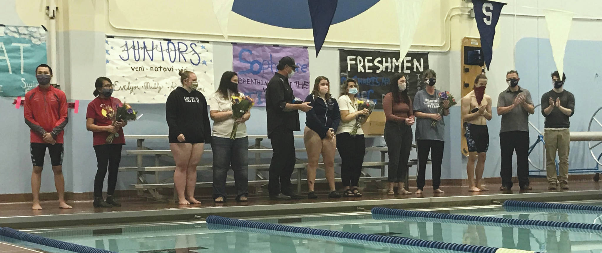 Soldotna High School senior swimmers are honored Oct. 30, 2020, at Soldotna High School. The seniors, from left to right, are Nathan Pitka, Emma Snyer, Deloma Watkins, Kat Gross and Brandon Christenson. (Photo provided by Luke Herman)