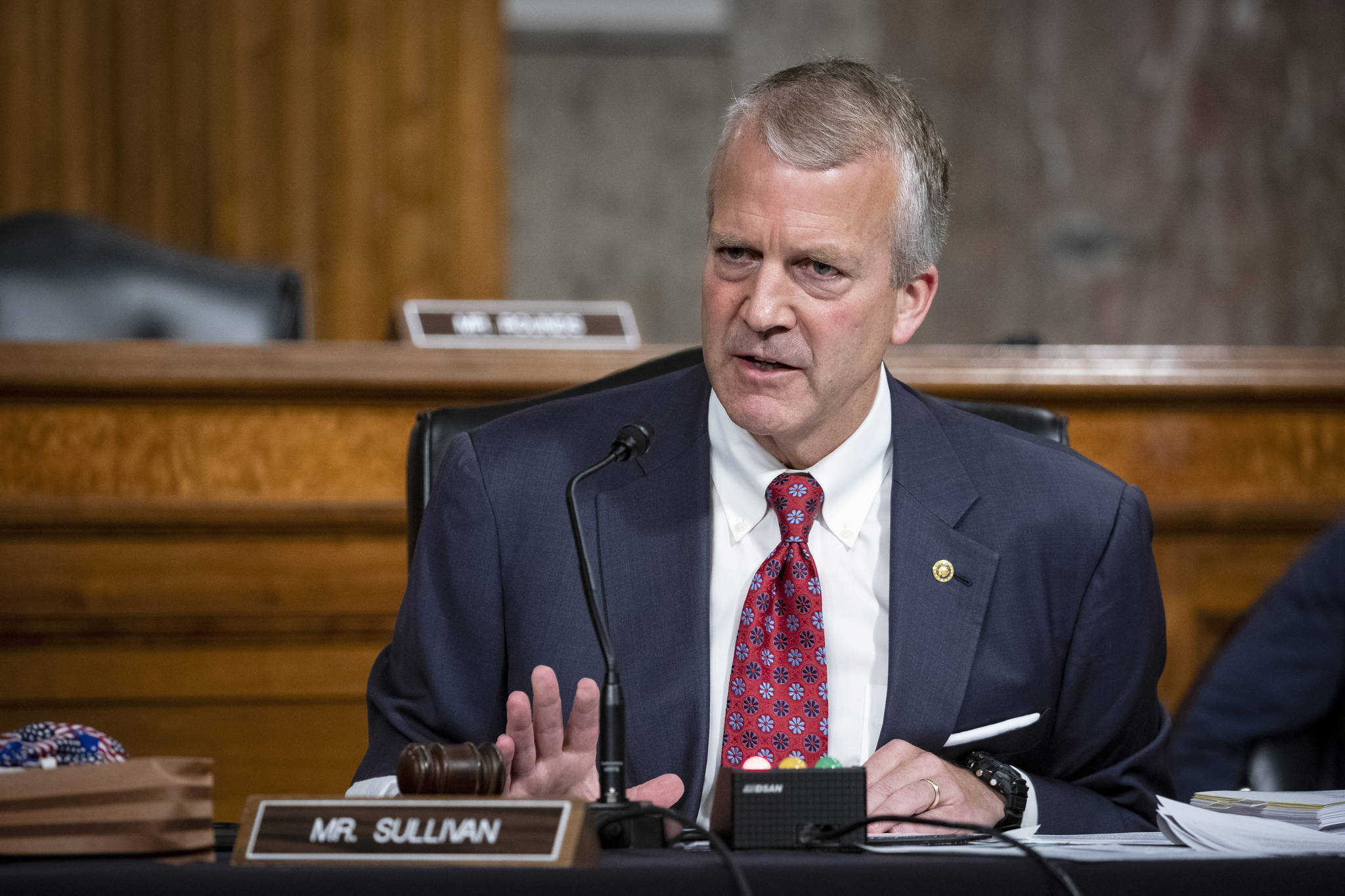 Al Drago / AP file
Sen. Dan Sullivan, R-Alaska, testifies during a hearing on Capitol Hill on May 7. Sullivan on Wednesday won reelection in Alaska, defeating independent Al Gross.