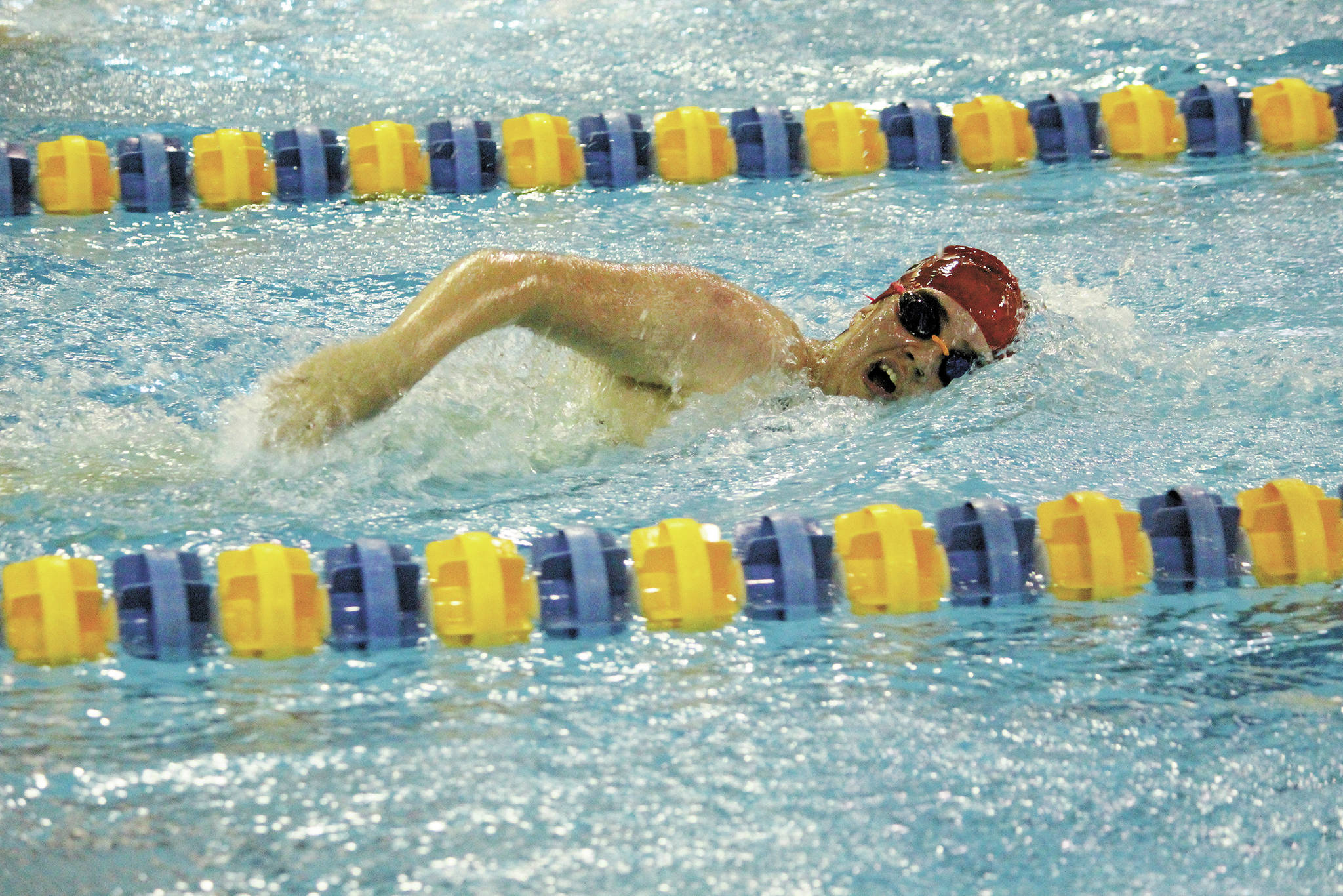 Kenai’s Rachael Pitsch swims the girls 500-yard freestyle on Saturday, Nov. 14, 2020 during the Kenai Peninsula Swimming Championships at the Kate Kuhns Aquatic Center in Homer, Alaska. (Photo by Megan Pacer/Homer News)