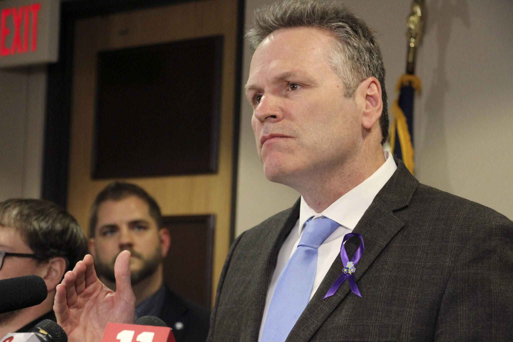 In this March 12, 2020 file photo, Alaska Gov. Mike Dunleavy speaks during a news conference in Anchorage, Alaska. Dunleavy faces criticism for his handling of COVID-19, from those who think he’s not doing enough to address rising case counts to those who think he’s been overreaching. (AP Photo/Mark Thiessen, File)