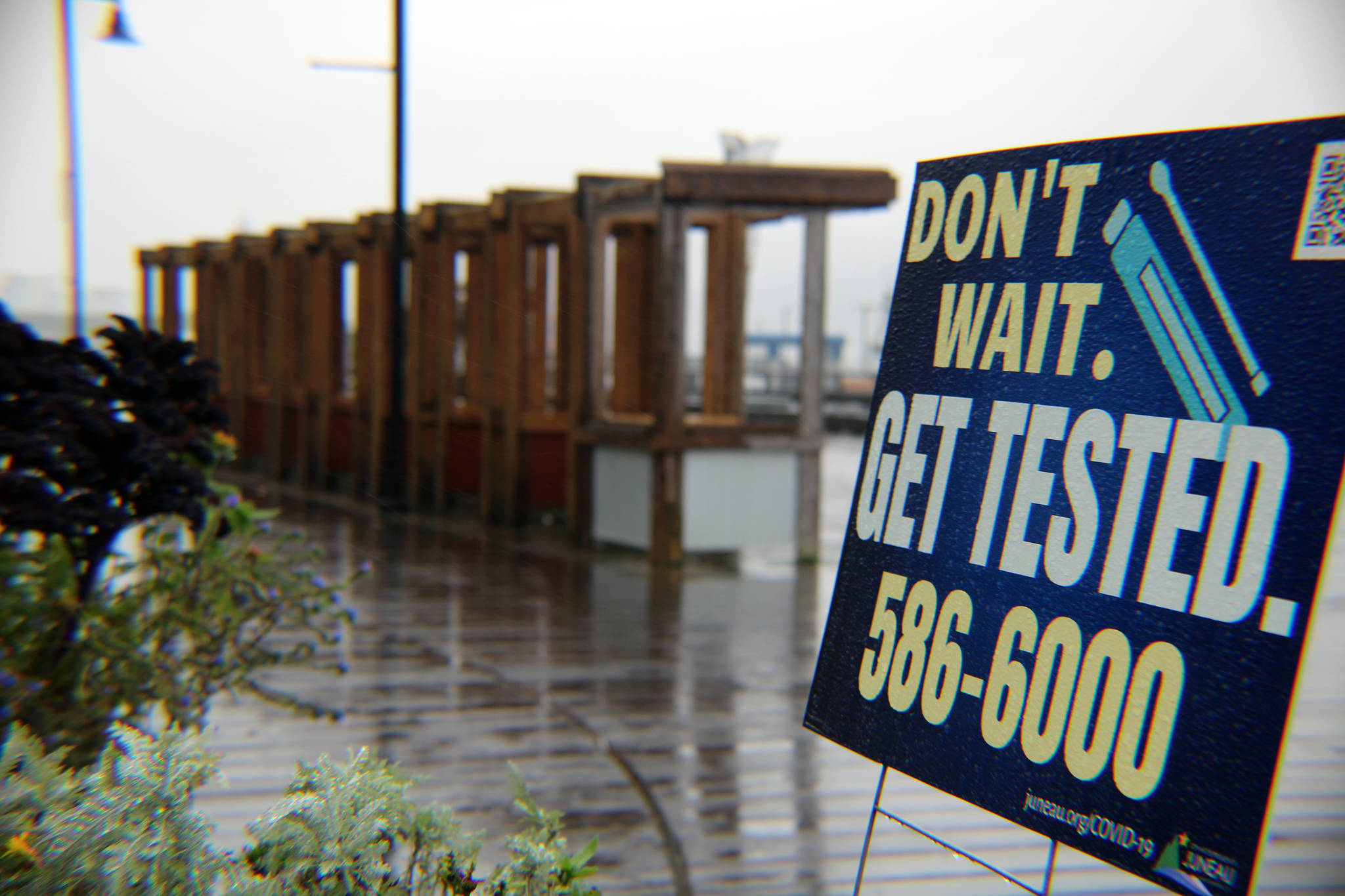 This September photo shows a sign in downtown Juneau encouraging people to get tested for COVID-19. Recent analysis shared by Alaska Department of Health and Social Services shows the majority of Alaskans have at least one underlying health condition that increases risk of serious illness from COVID-19. (Ben Hohesntatt / Juneau Empire File)