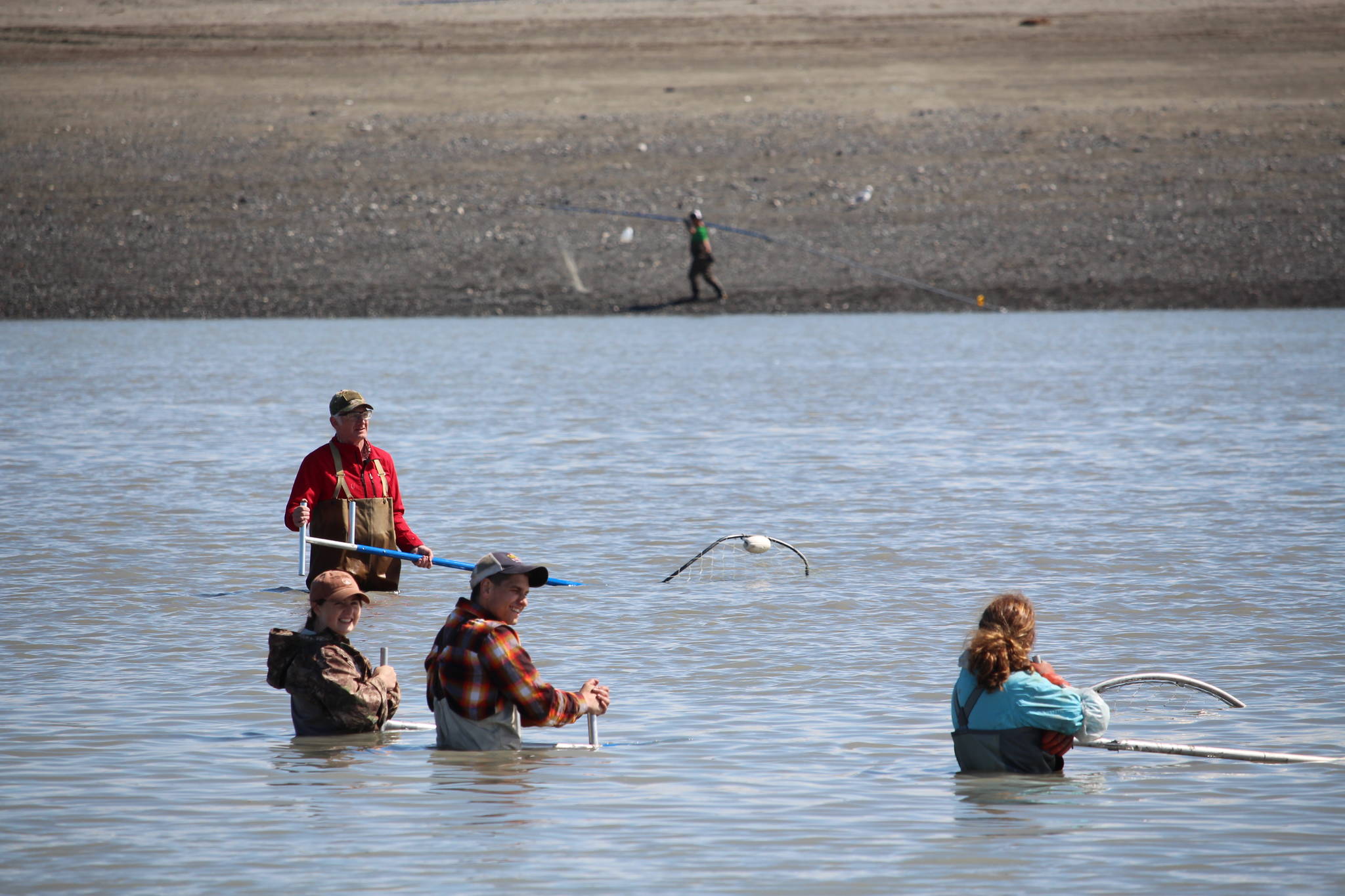 Dipnetters fish in the Kenai River on July 10, 2020. (Photo by Brian Mazurek/Peninsula Clarion)