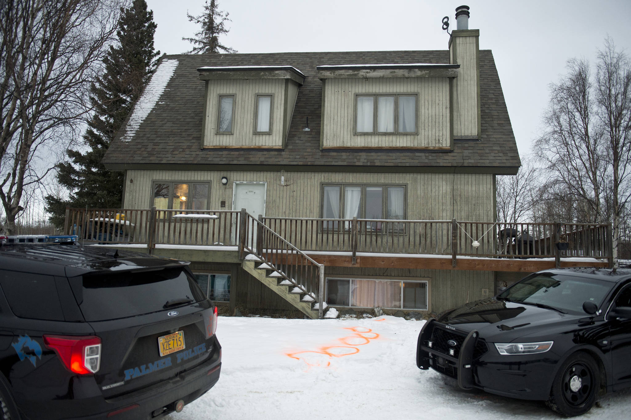 Associated Press
Alaska State Troopers investigate a fatal shooting scene at a home on North Valley Way in Palmer, on Monday.