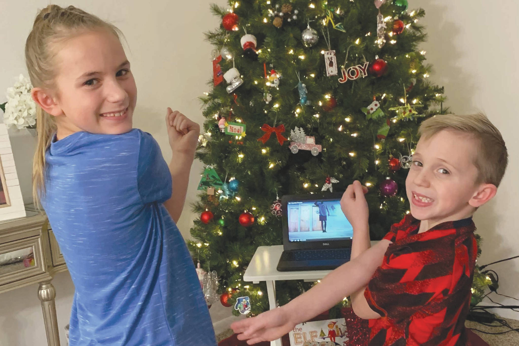 Kaleidoscope School of Arts and Science students Brooklyn and Easton Coleman participate remotely in their home in the physical education class of Todd Boonstra on Tuesday, Dec. 1, 2020. (Photo provided by Megan Coleman)