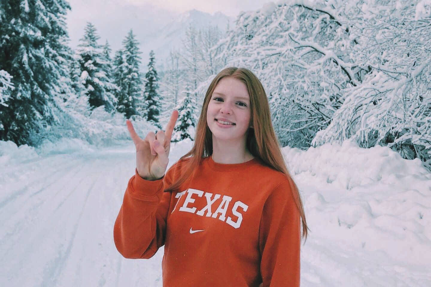 Lydia Jacoby celebrates her commitment to the University of Texas in Seward recently. (Photo by Leslie Jacoby)