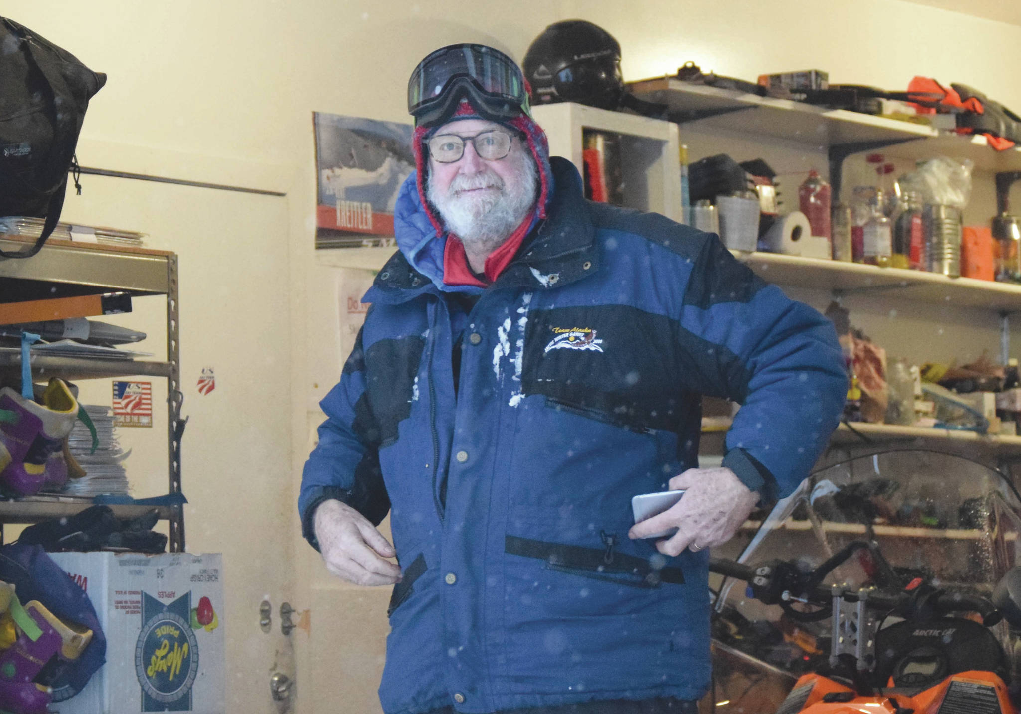 Bill Holt sits in the maintenance shed at Tsalteshi Trails just outside of Soldotna, Alaska, on Tuesday, Dec. 15, 2020. Holt retires as facilities and equipment manager on Friday. He started working at the trails in the winter of 1993-94. (Photo by Jeff Helminiak/Peninsula Clarion)