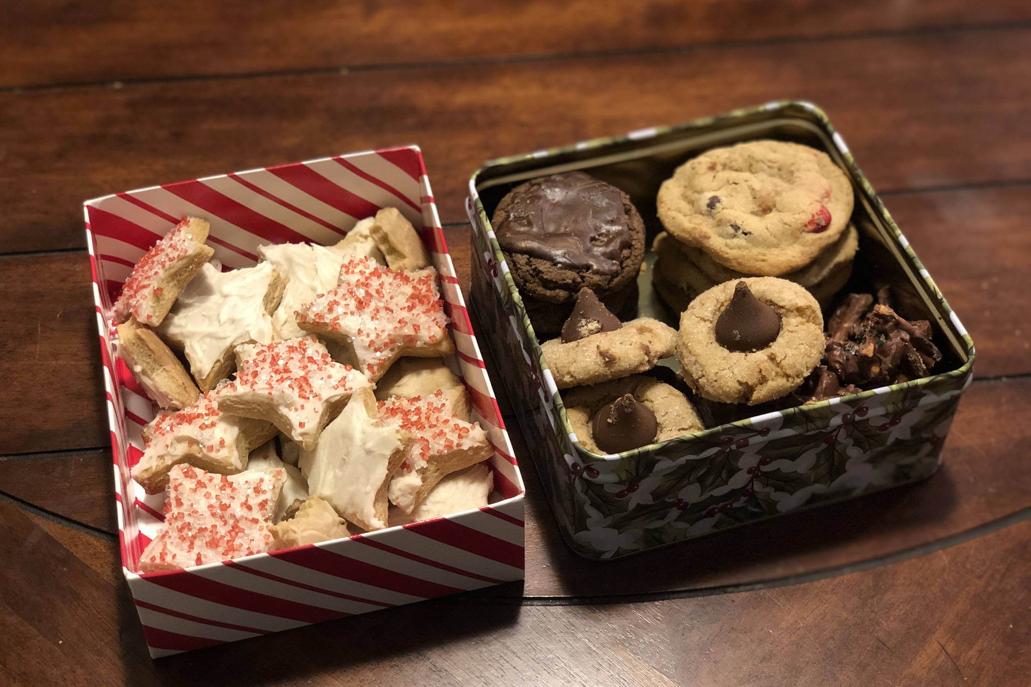 Two cookie boxes our household received from nearby friends, photographed on Dec. 21, 2020, in Anchorage, Alaska. (Photo by Victoria Petersen/Peninsula Clarion)