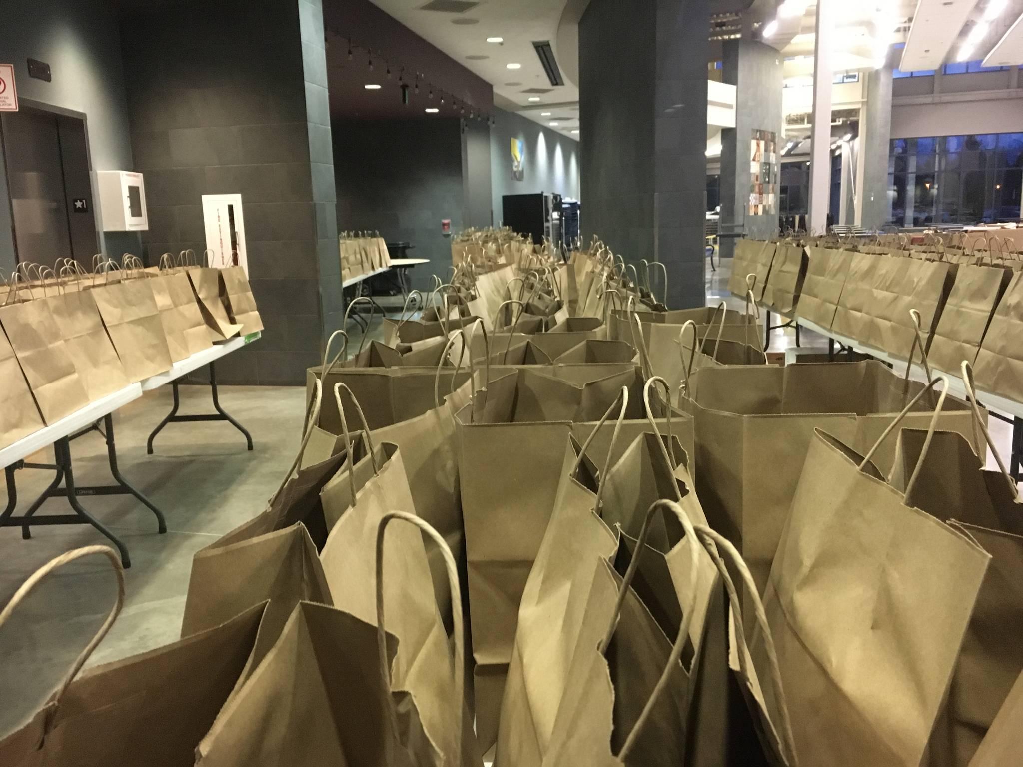 The Juneau School District prepares hundreds of meals each weekday to feed children in Juneau as seen here at Thunder Mountain High School on Dec. 21.