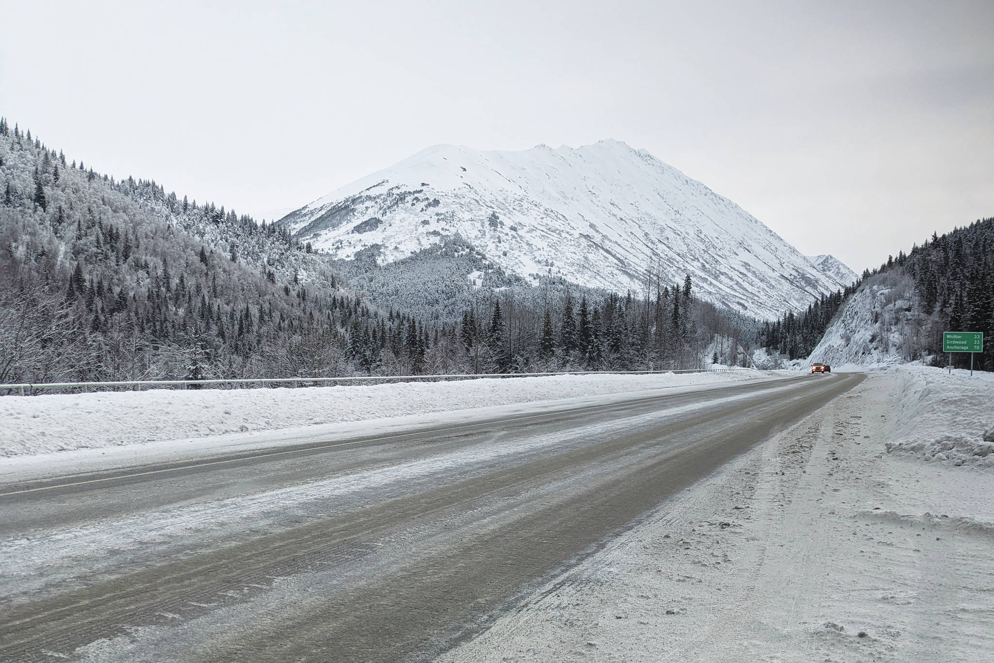 Motorists travel on the Seward Highway near the Hope Highway cutoff in Alaska on Thursday, Dec. 24, 2020. (Photo by Erin Thompson/Peninsula Clarion)