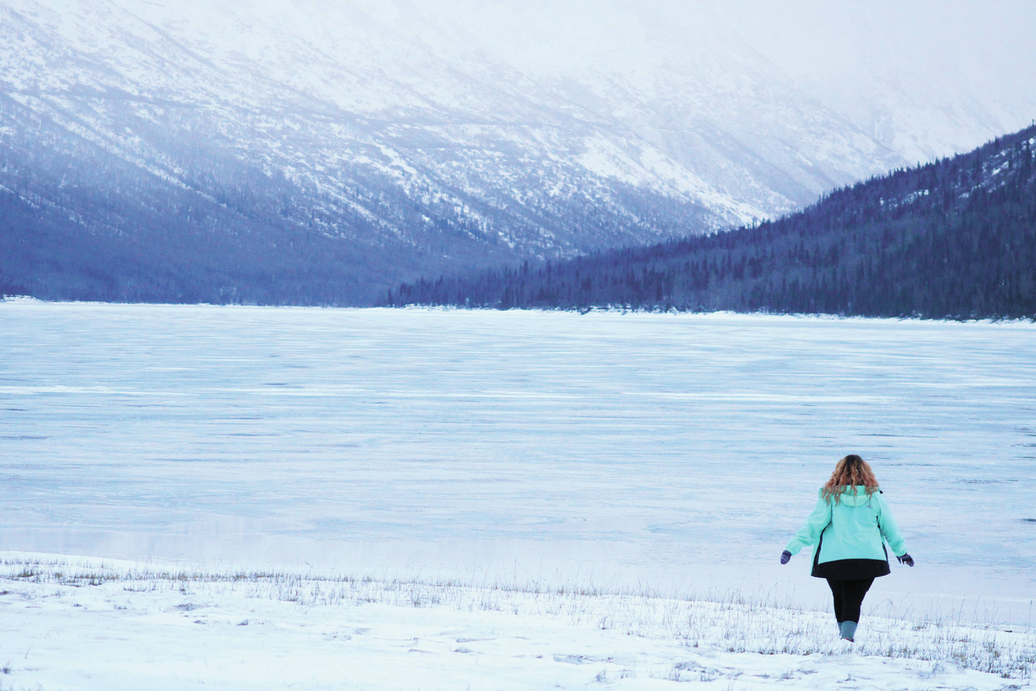 The author looks across Eklutna Lake on Monday, Dec. 28, 2020 near Eagle River, Alaska. (Photo by Tim Rockey)