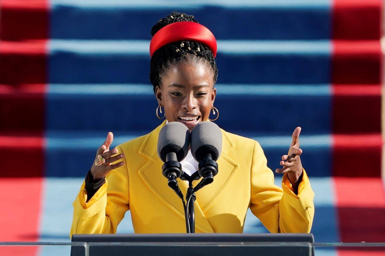 American poet Amanda Gorman reads a poem during the 59th Presidential Inauguration at the U.S. Capitol in Washington, Wednesday, Jan. 20, 2021. (AP Photo/Patrick Semansky, Pool)