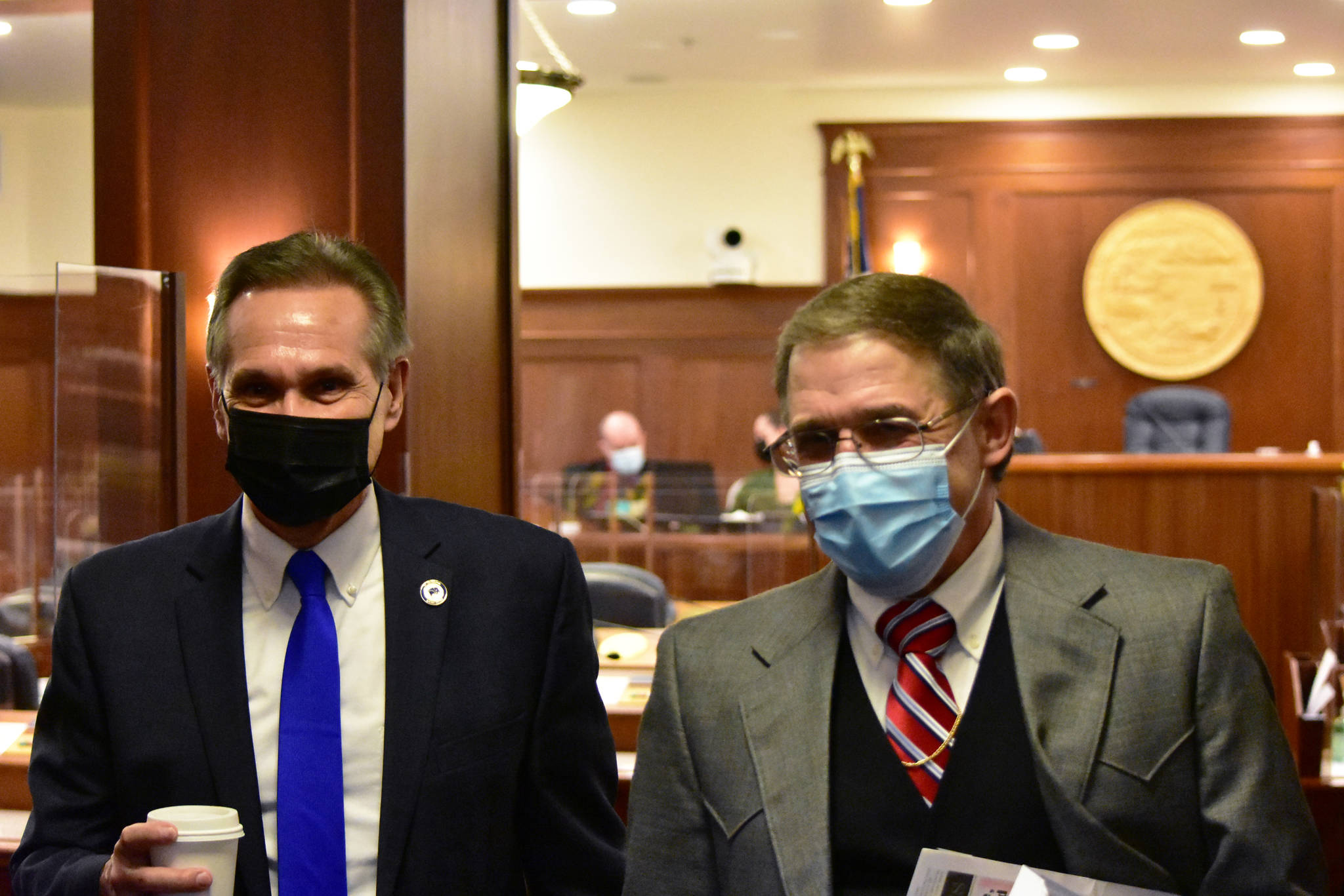 Lt. Gov. Kevin Meyer, left, leaves the Alaska House of Representatives chamber Thursday, Jan. 21, 2021, with George Rauscher, R-Sutton, after a brief floor session where lawmakers failed to nominate a temporary speaker. Meyer will preside over the body until a leadership is elected. (Peter Segall / Juneau Empire)