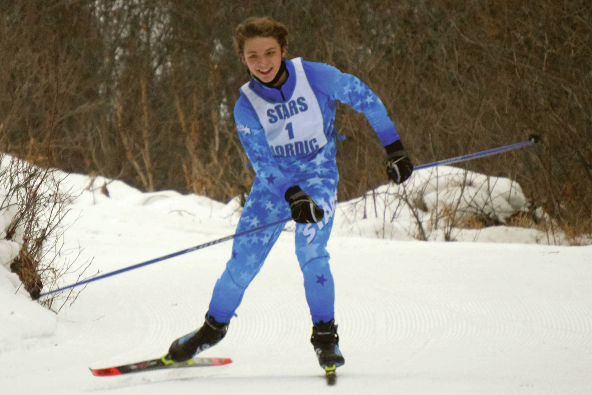 Soldotna's Quinn Cox gets first tracks as he skis to second place in the Soldotna Invite on Saturday, Jan. 23, 2021, at Tsalteshi Trails just outside of Soldotna, Alaska. (Photo by Jeff Helminiak/Peninsula Clarion)
