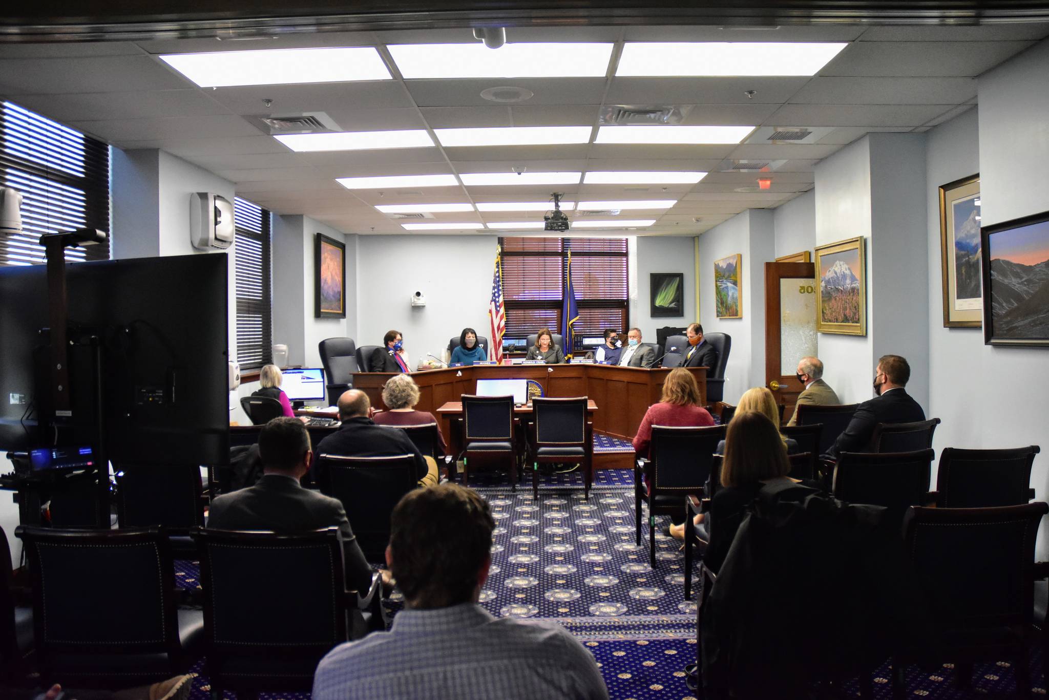 Peter Segall / Juneau Empire
Staff, lawmakers and members of the press gather Wednesday for the first Senate Judiciary Committee meeting of the 32nd Legislature. While senators moved ahead with work, the House of Representatives was once again unable to organize.
Staff, lawmakers and members of the press gather for the first Senate Judiciary Committee meeting of the 32nd Legislature on Wednesday, Jan. 27, 2021. While Senators moved ahead with work, the House of Representatives was once again unable to organize. (Peter Segall / Juneau Empire)