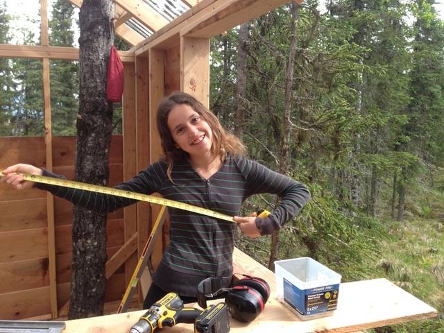 Photo courtesy Eliza Eller 
Rosalie Eller pauses construction work to pose for a photo in Ionia in the summer of 2020.