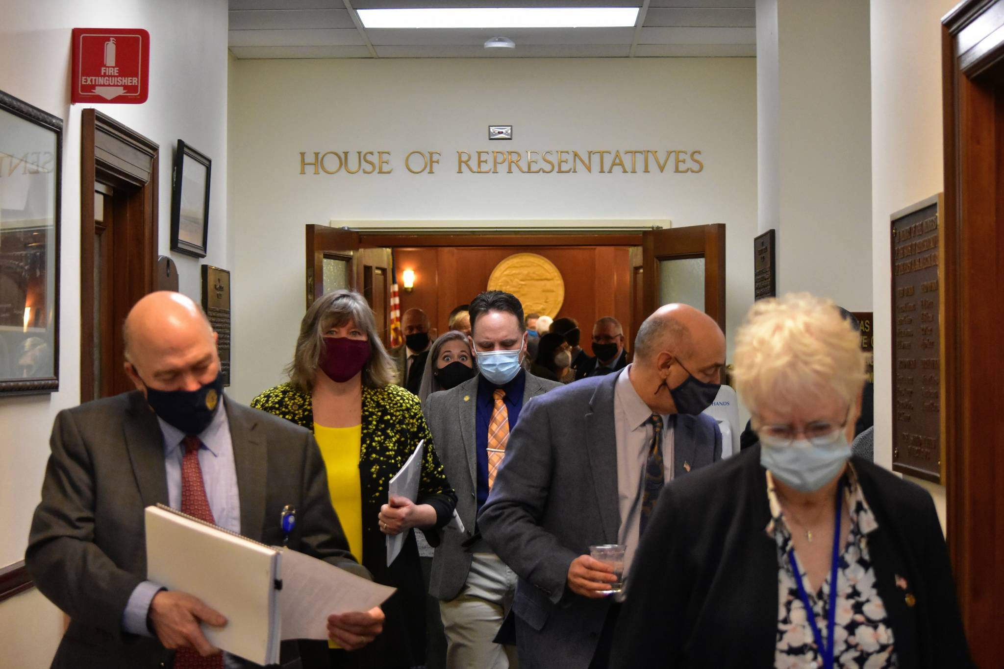 Members of the House of Representatives leave the chamber Wednesday, Feb. 3,. after failing to elect a temporary speaker, part of a deadlock that was broken Thursday, when Rep. Josiah Patkotak was elected speaker pro tem. (Peter Segall / Juneau Empire)