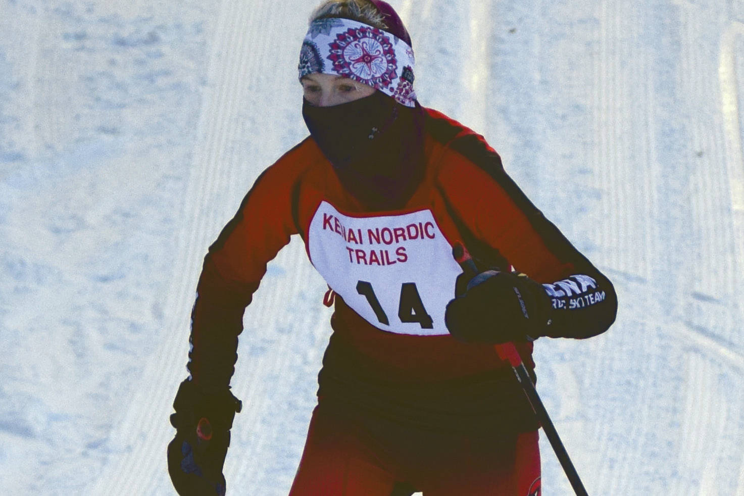 Elizabeth Moffet skis up a hill during the Kenai Klassic on Saturday, Feb. 6, 2021, at the Kenai Nordic Trails in Kenai, Alaska. (Photo by Jeff Helminiak/Peninsula Clarion)