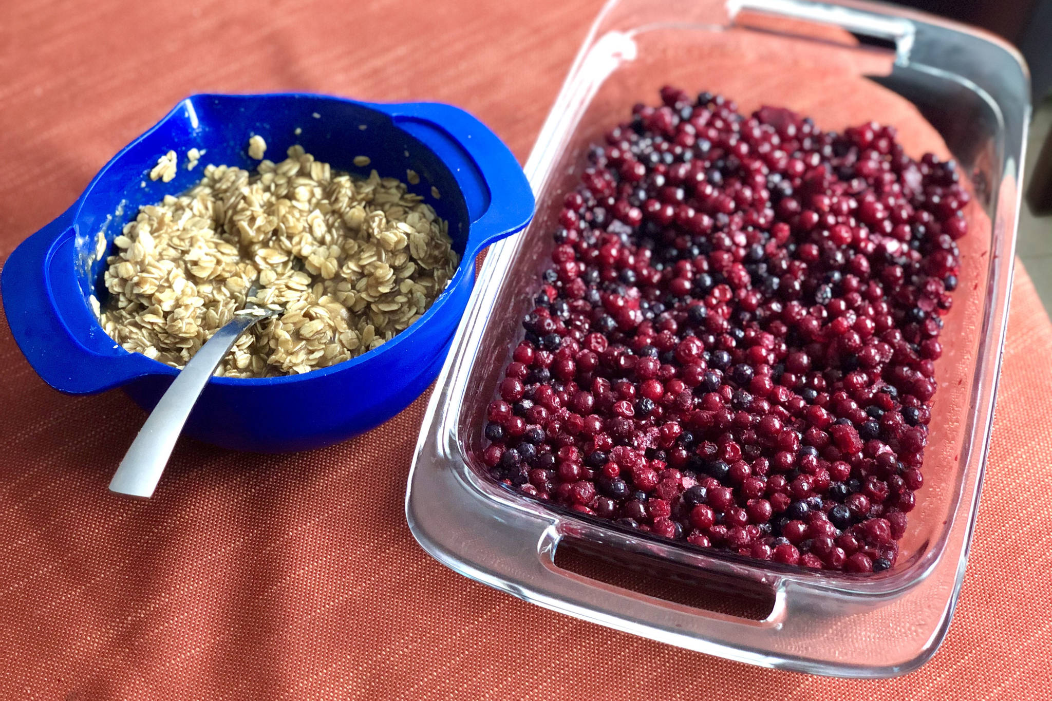 Getting my ingredients ready for blueberry crumble, where the berries can be prepared right in the pan and the topping in a small bowl, photographed on Tuesday, Feb. 16, 2021, in Anchorage, Alaska (Photo by Victoria Petersen/Peninsula Clarion)