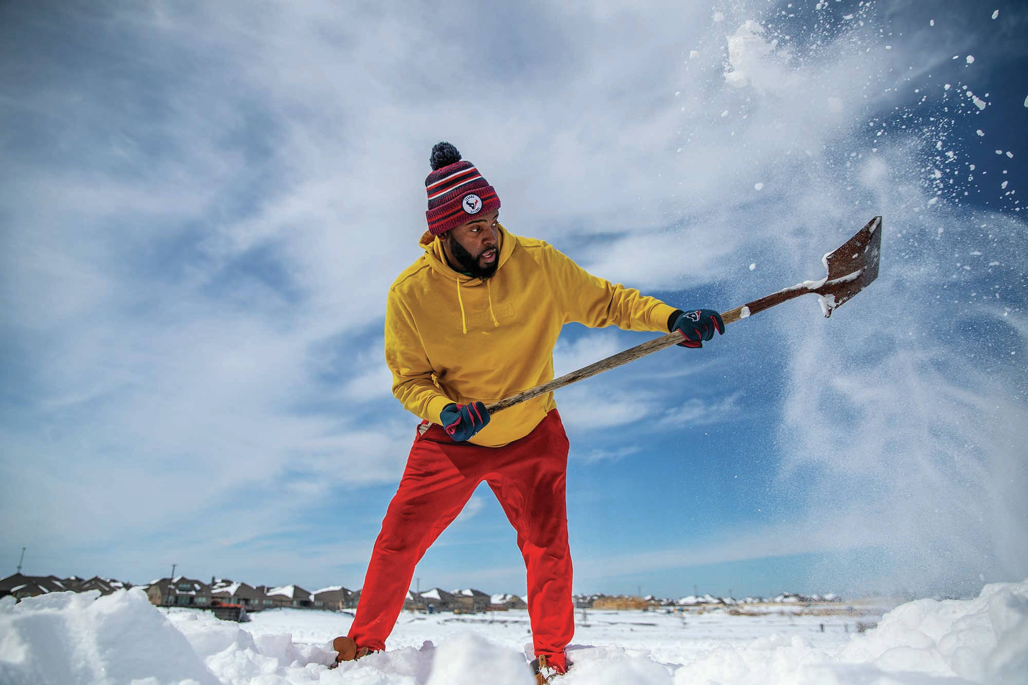 Howard Mamou shovels snow at the Glennwood in Hutto, Texas, Tuesday, Feb 16, 2021. The worst U.S. power outages were in Texas, affecting more than 2 million homes and businesses. (Ricardo B. Brazziell/Austin American-Statesman via AP)
Howard Mamou shovels snow at the Glennwood in Hutto, Texas, Tuesday, Feb 16, 2021. The worst U.S. power outages were in Texas, affecting more than 2 million homes and businesses. (Ricardo B. Brazziell/Austin American-Statesman via AP)