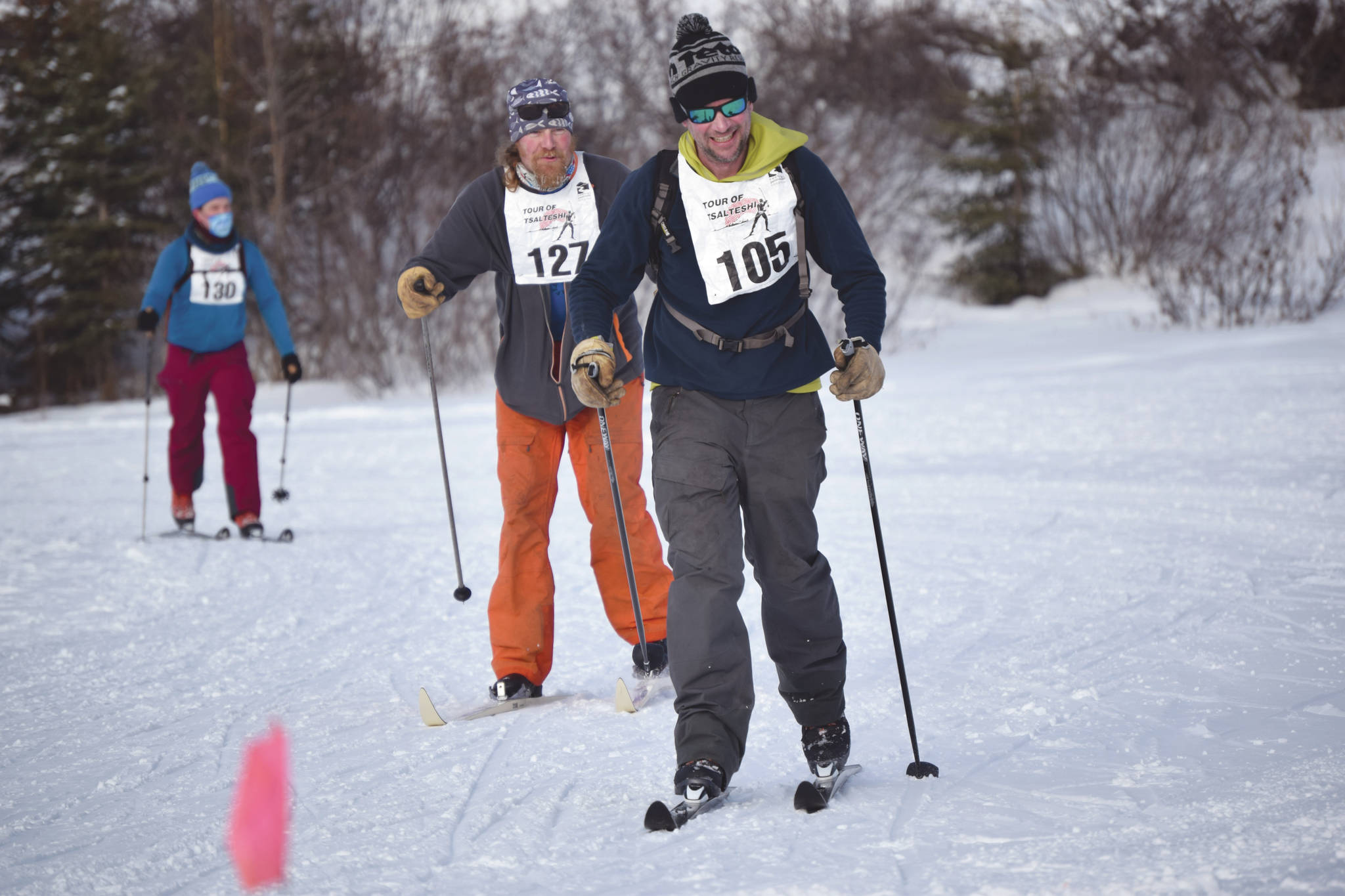 Jeff Helminiak / Peninsula Clarion 
Sam Spencer, Erik Route and Josiah Brown, all of Cooper Landing, near the finish of Sunday’s 20-kilometer classic race at Tsalteshi Trails just outside of Soldotna.