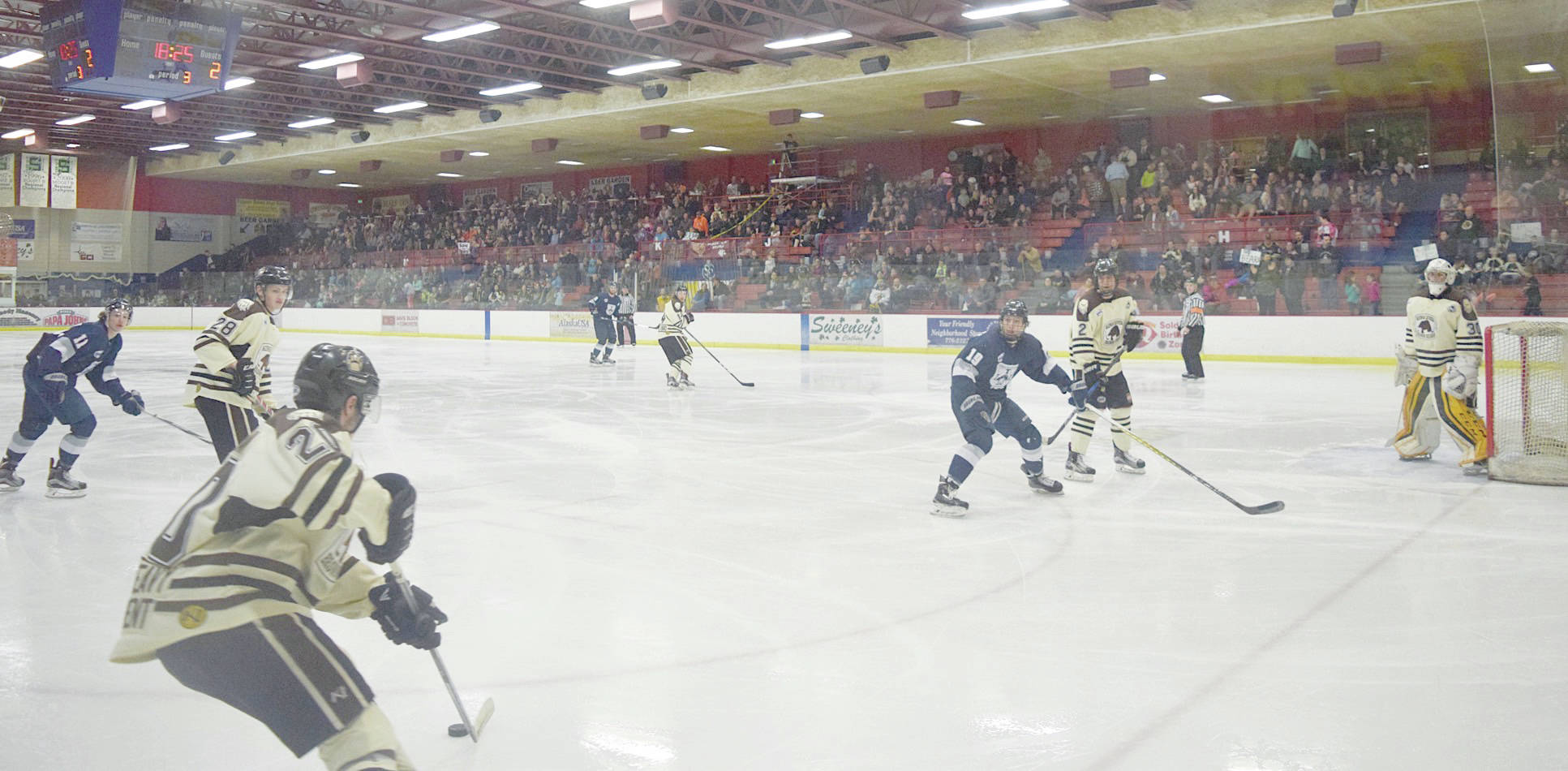 Jeff Helminiak/Peninsula Clarion
Kenai River Brown Bears defenseman Shayne Monahan controls the puck early in the third period as 1,113 fans watch Friday, March 24, 2017, at the Soldotna Regional Sports Complex.