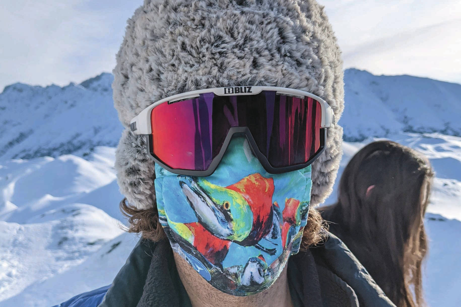 The author gets warm with a mask at Alaska’s Matanuska Glacier on Sunday, March 7, 20201. (Photo by Jeff Helminiak/Peninsula Clarion)