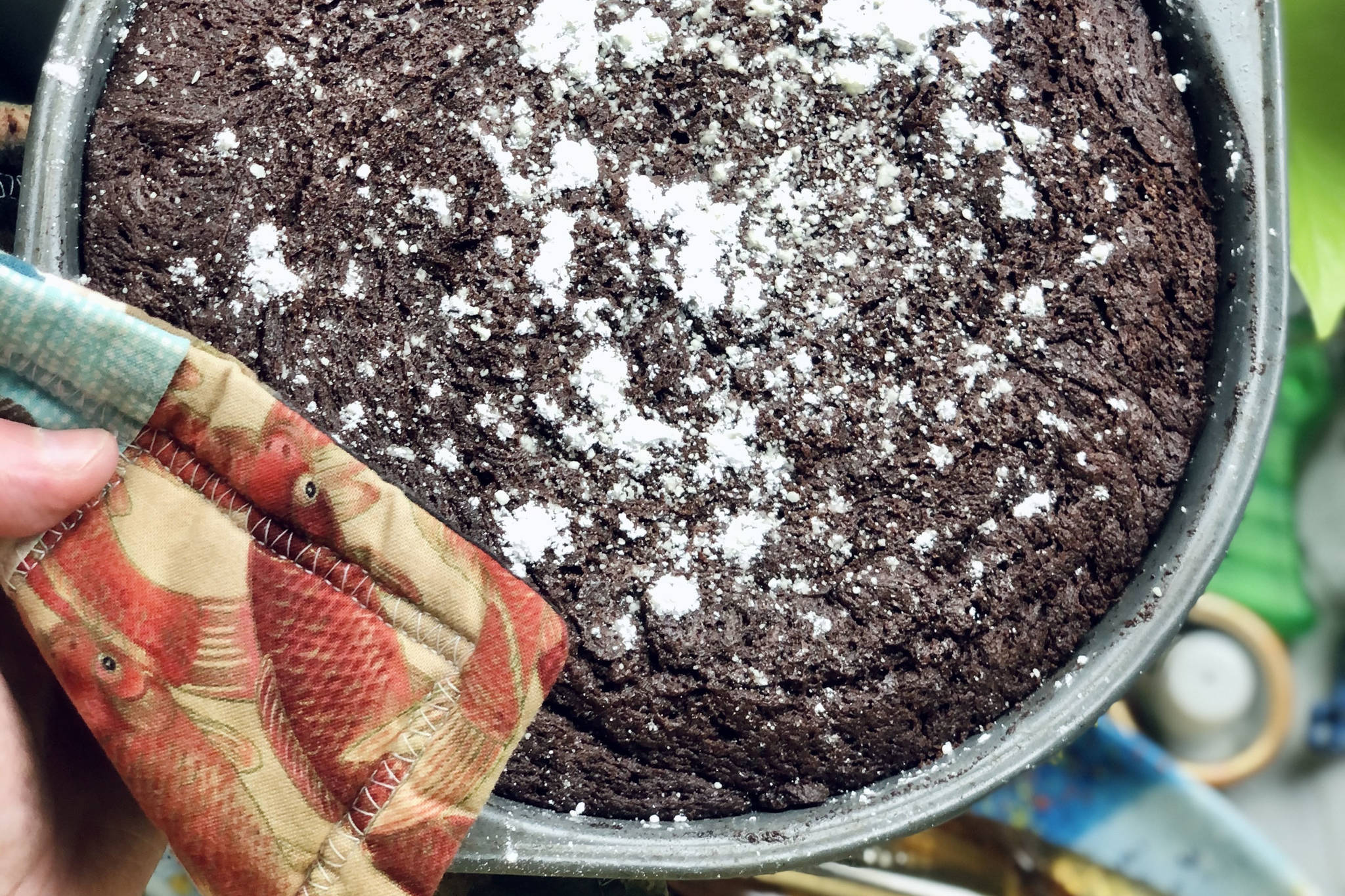 Kladdkaka sprinkled with powdered sugar is ready to be eaten, photographed on Tuesday, March 9, 2021, in Anchorage, Alaska. (Photo by Victoria Petersen/Peninsula Clarion)