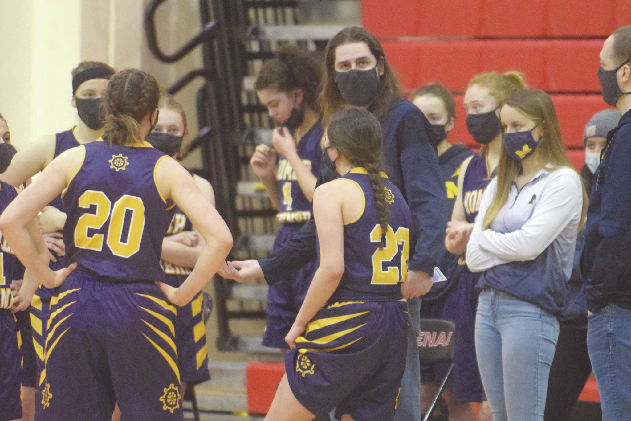 Homer head coach Chad Felice prepares his team March 4, 2021, against Kenai Central at Kenai Central High School in Kenai, Alaska. (Photo by Jeff Helminiak/Peninsula Clarion)