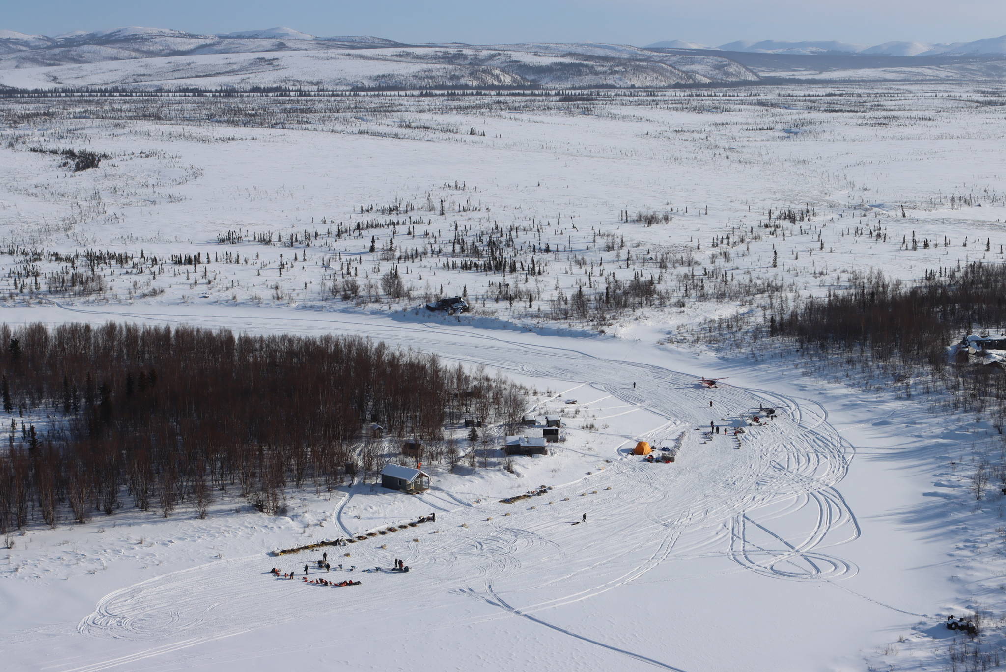 The Iditarod checkpoint is nestled in a bend in the Iditarod River, in this aerial view Thursday, March 11, 2021, during the Iditarod Trail Sled Dog Race. (Zachariah Hughes/Anchorage Daily News via AP, Pool)