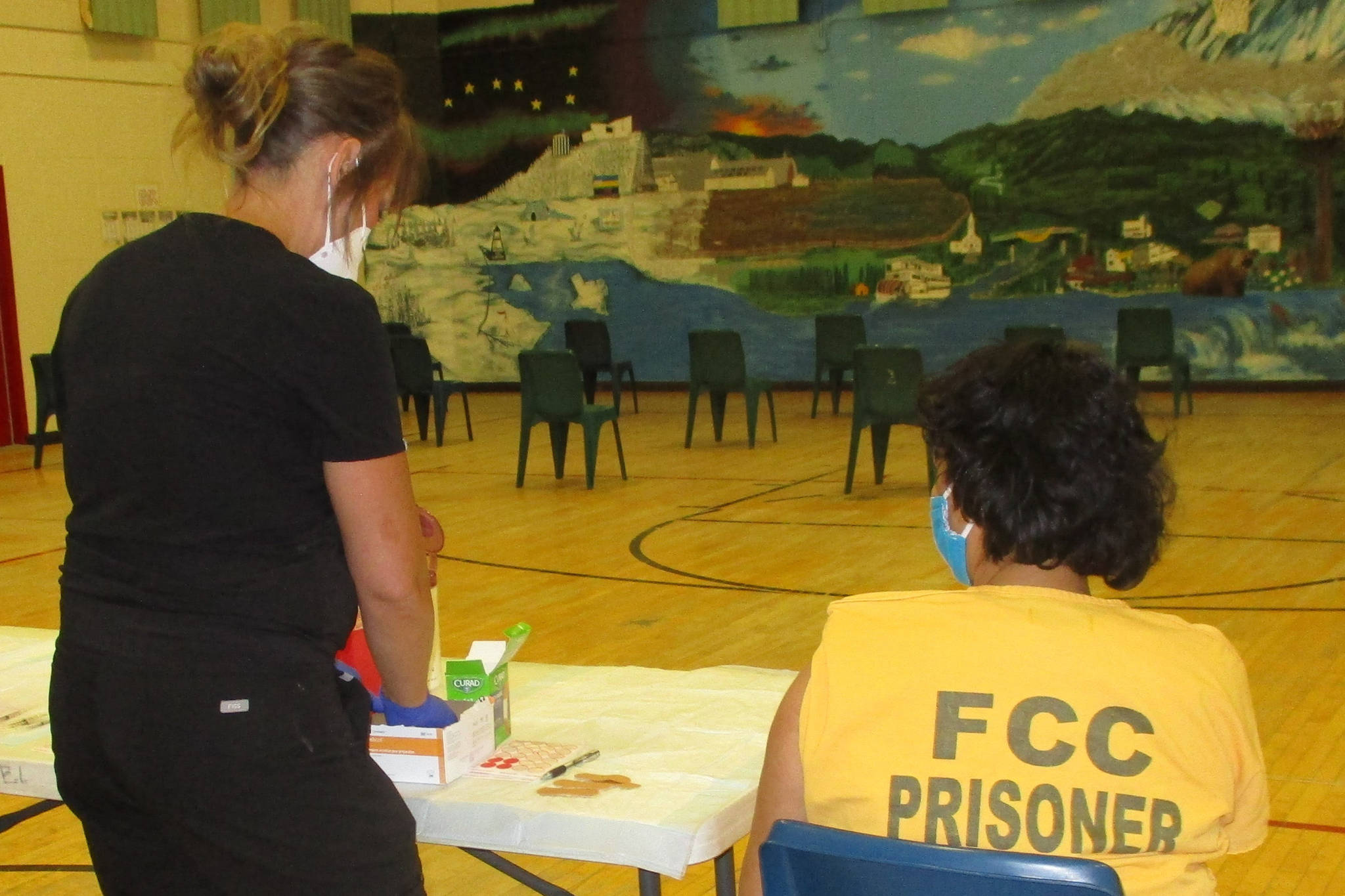 A Department of Corrections nurse vaccinates a Fairbanks Correctional Center inmate. The DOC eased restrictions on March 15, 2021, to allow attorneys to visit fully vaccinated inmates at DOC facilities. (Courtesy Photo / DOC)