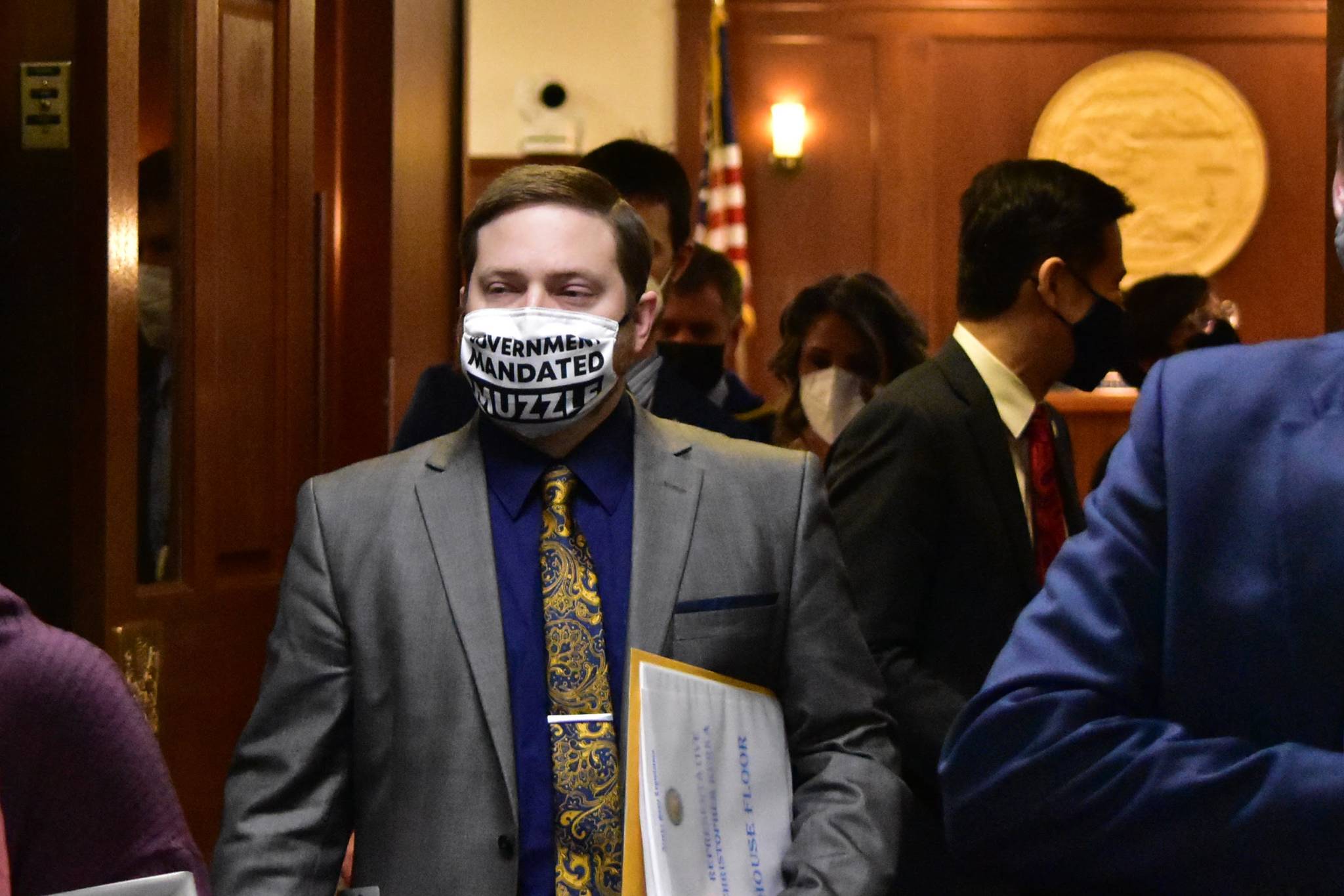 Rep. Chris Kurka, R-Wasilla, leaves the chambers of the Alaska House of Representatives on Friday, March 19, 2021, after an hour of delays concerning the wording on his mask. (Peter Segall / Juneau Empire)