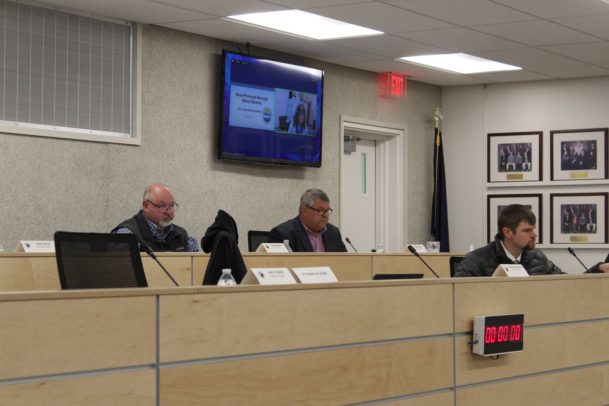 James Baisden (left), Charlie Pierce (middle) and Jesse Bjorkman (right) attend a joint work session with the Kenai Peninsula Borough School District on Tuesday, Feb. 2, 2021. (Ashlyn O’Hara/Peninsula Clarion)