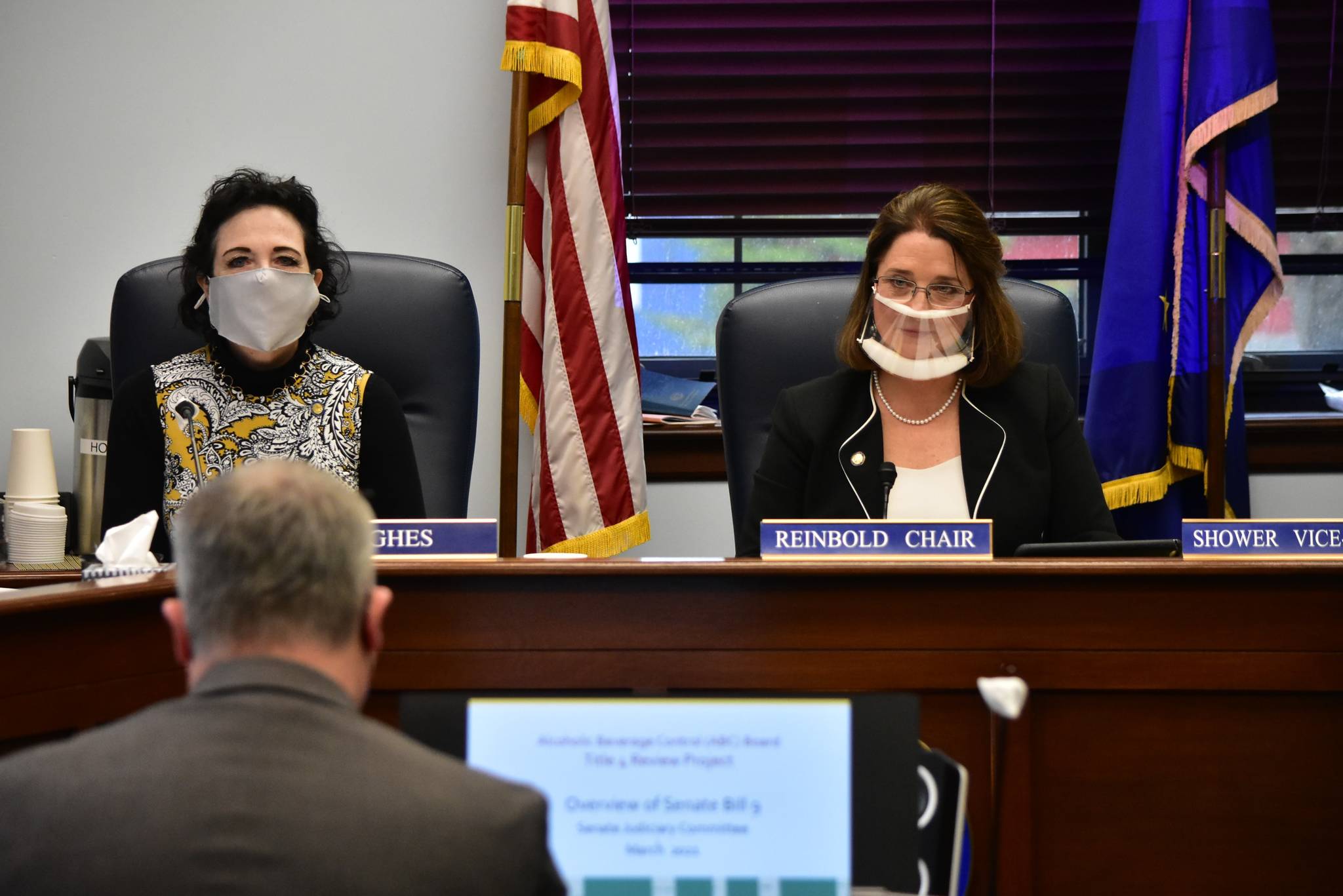 Peter Segall / Juneau Empire
Sens. Shelley Hughes, R-Palmer, left, and Lora Reinbold, R-Eagle River, question acting Attorney General Treg Taylor about the administration’s approach to legal matters at a Senate Judiciary Committee hearing on Wednesday.