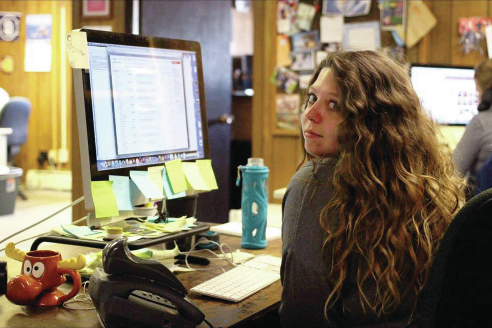 The author gets caught off guard while working at the Peninsula Clarion in 2016 in Kenai, Alaska. (Photo by Ben Boettger)