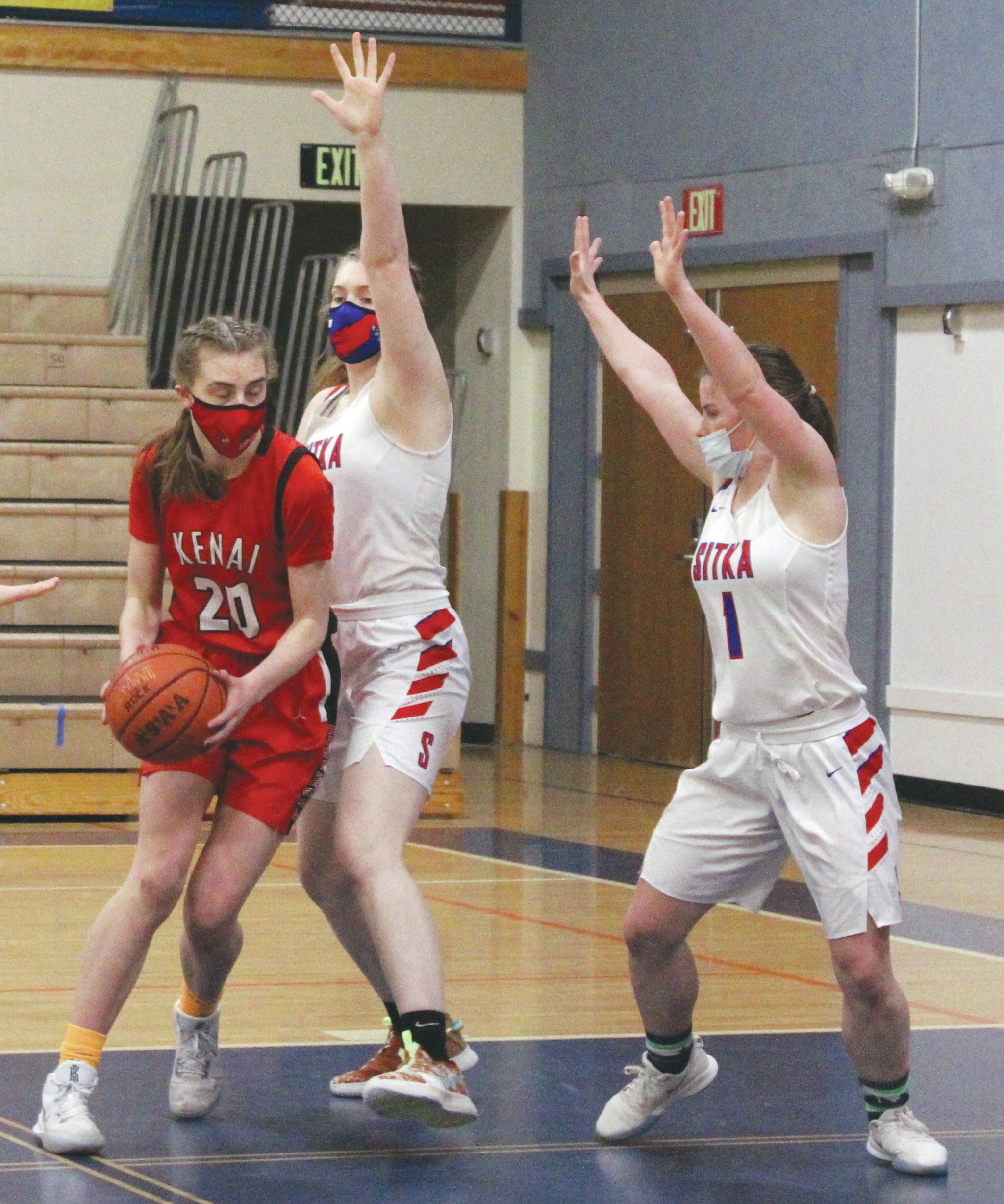 Kenai Central’s Erin Koziczkowski posts up on Sitka on Thursday, March 25, 2021, at the Class 3A girls state tournament at Palmer Middle School in Palmer, Alaska. (Photo by Tim Rockey/Frontiersman)